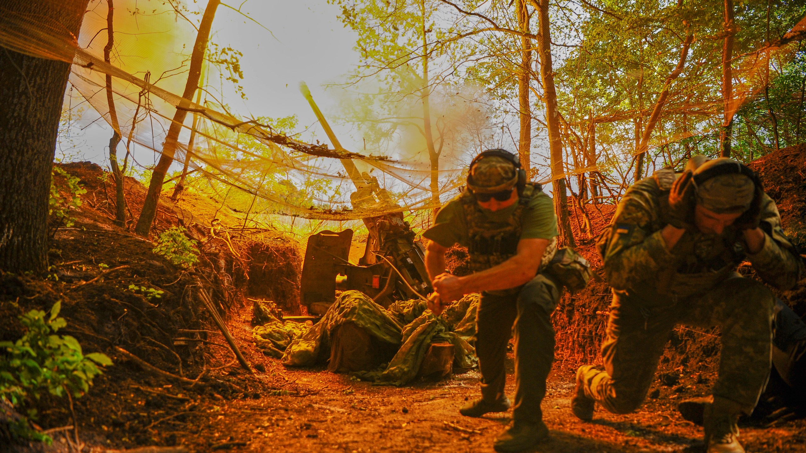FILE - In this photo provided by Ukraine's 127th Separate Brigade of the Territorial Defense press service, soldiers fire toward Russian army positions near Kharkiv, Ukraine, on Monday, June 2, 2025. (Anatolii Lysianskyi/Ukraine's 127th Separate Brigade via AP, File)