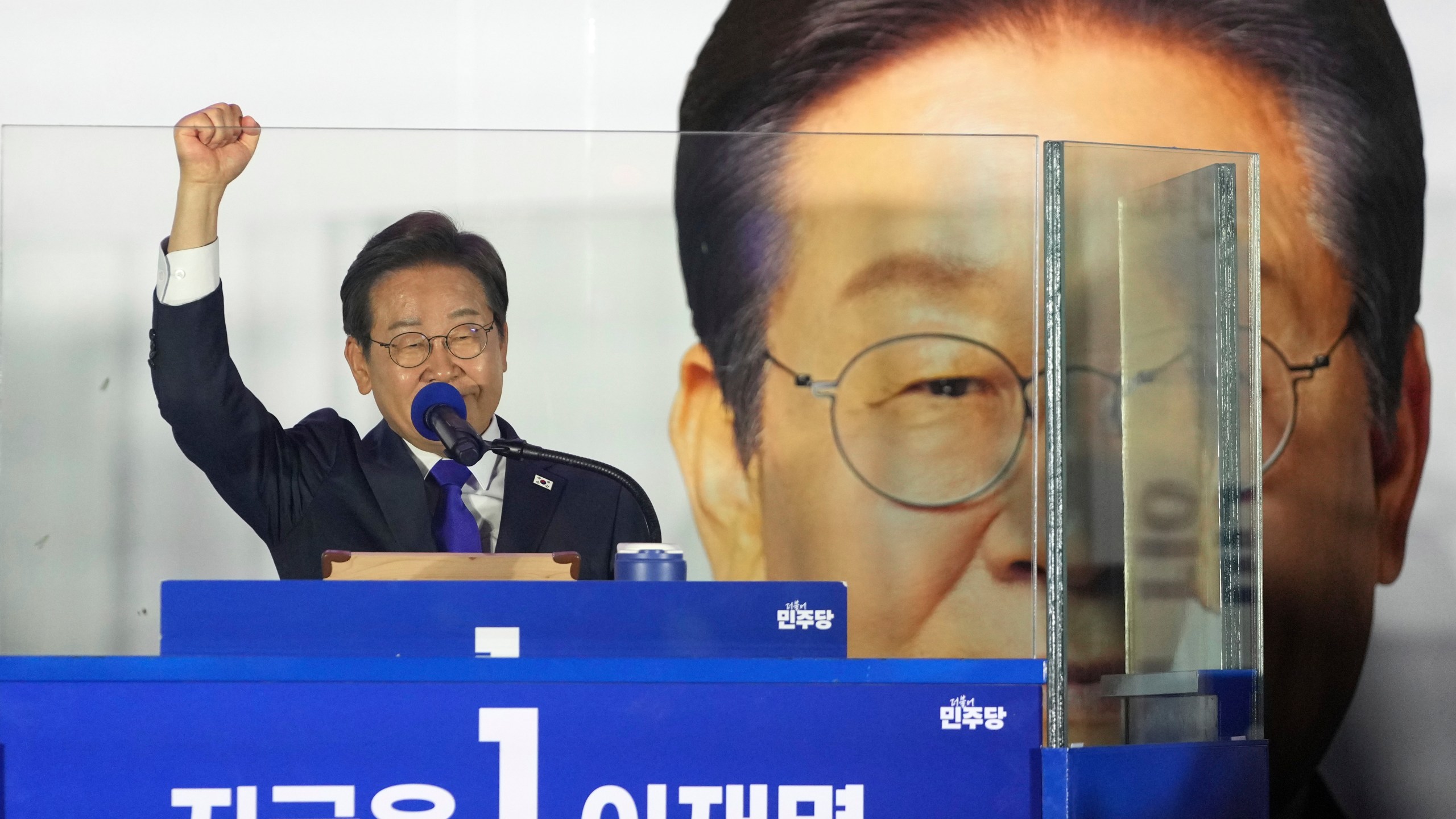 South Korea's Democratic Party's presidential candidate Lee Jae-myung, gestures as he speaks to supporters outside of the National Assembly in Seoul, South Korea, Wednesday, June 4, 2025. (AP Photo/Lee Jin-man)