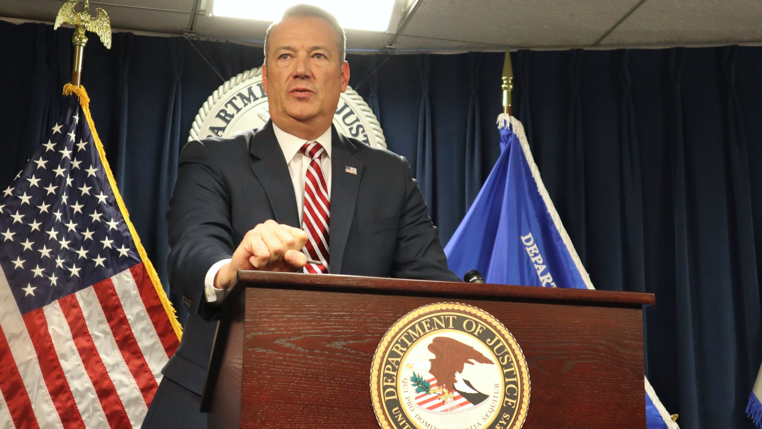 U.S. Immigration and Customs Enforcement Acting Director Todd Lyons announces that his agency took nearly 1,500 immigrants into custody in Massachusetts over the month of May during a news conference at the John Joseph Moakley U.S. Courthouse in Boston, Monday, June 2, 2025. (AP Photo/Leah Willingham)