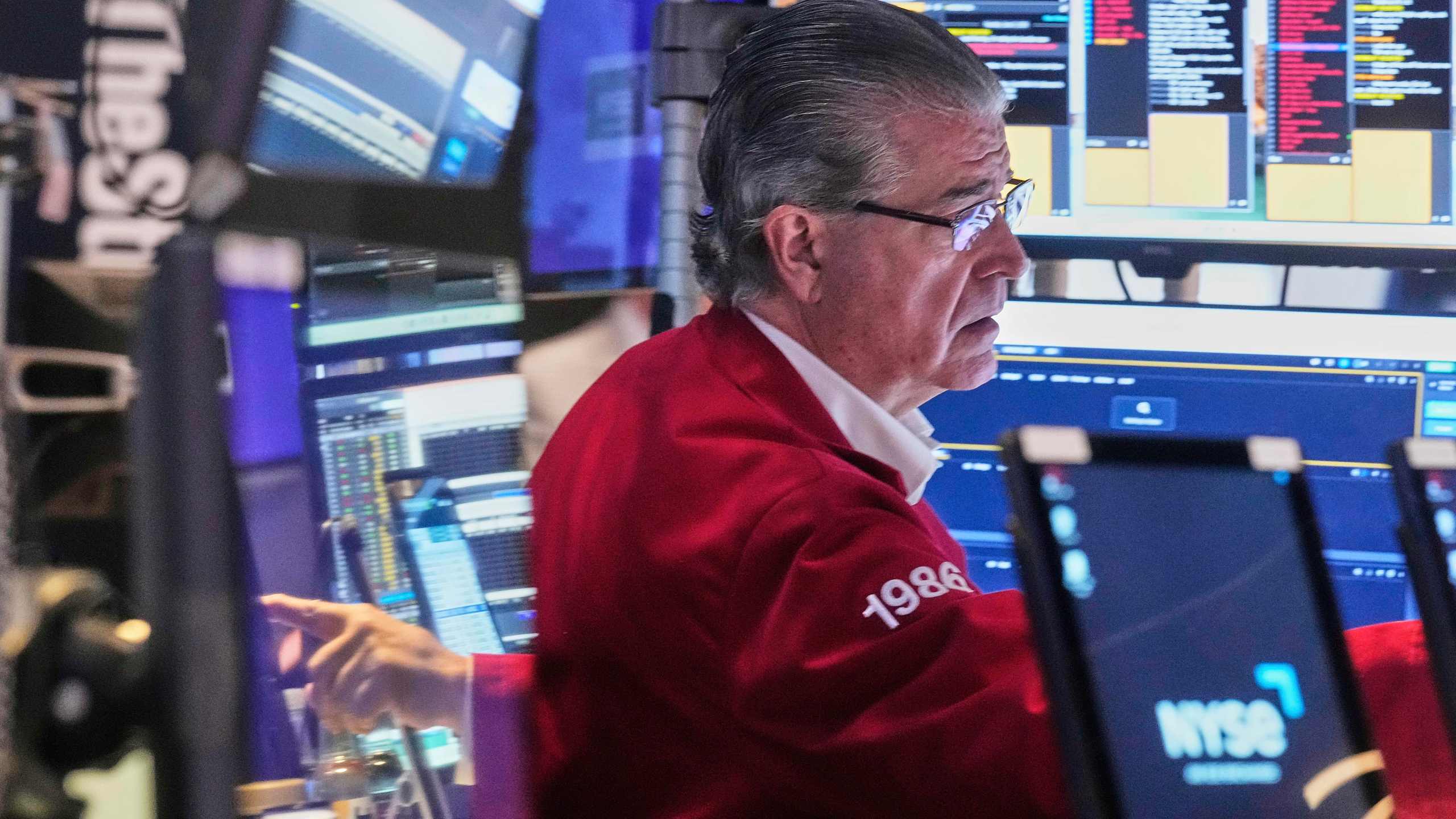 Trader Daniel Kryger works on the floor of the New York Stock Exchange, Tuesday, June 3, 2025. (AP Photo/Richard Drew)