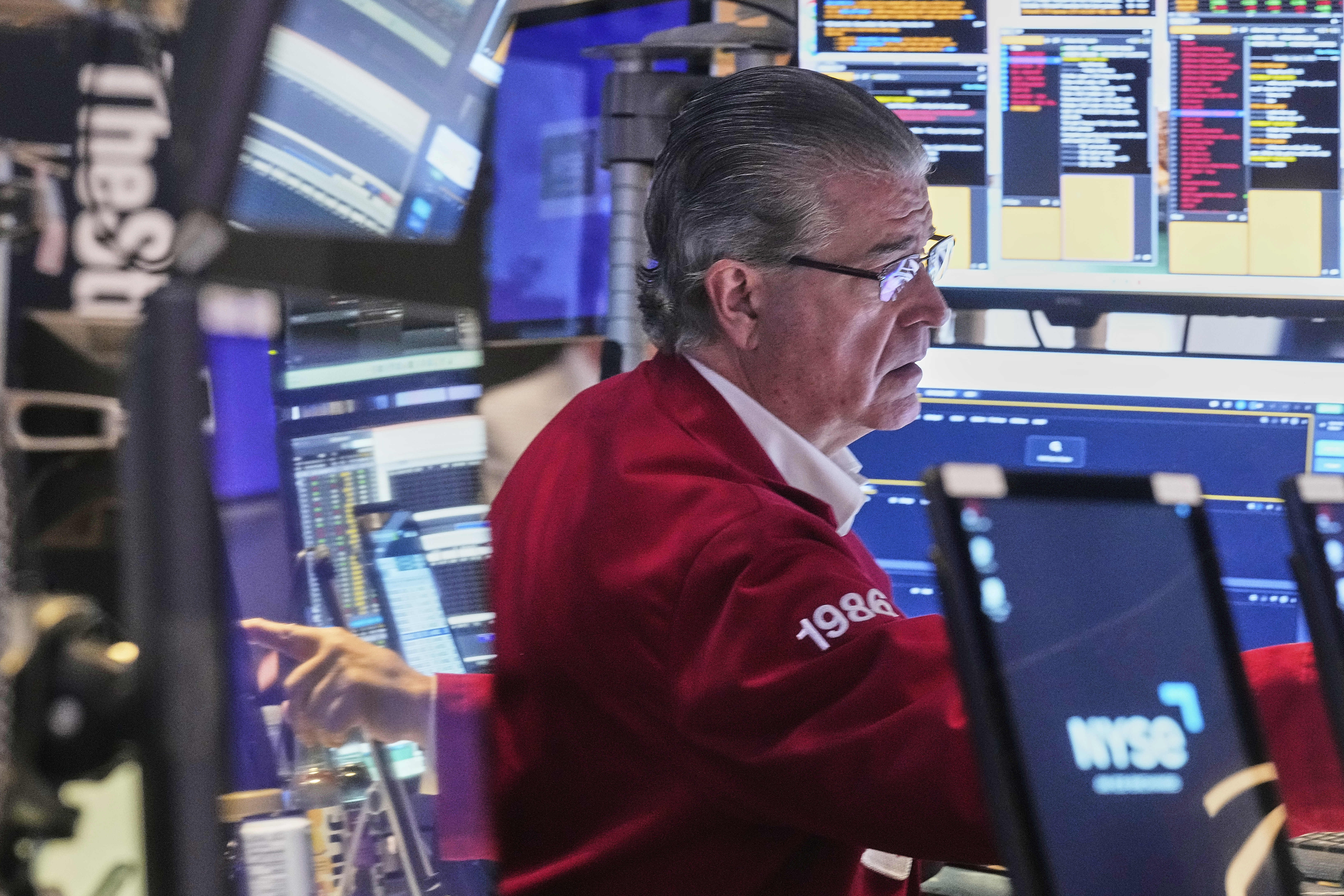 Trader Daniel Kryger works on the floor of the New York Stock Exchange, Tuesday, June 3, 2025. (AP Photo/Richard Drew)