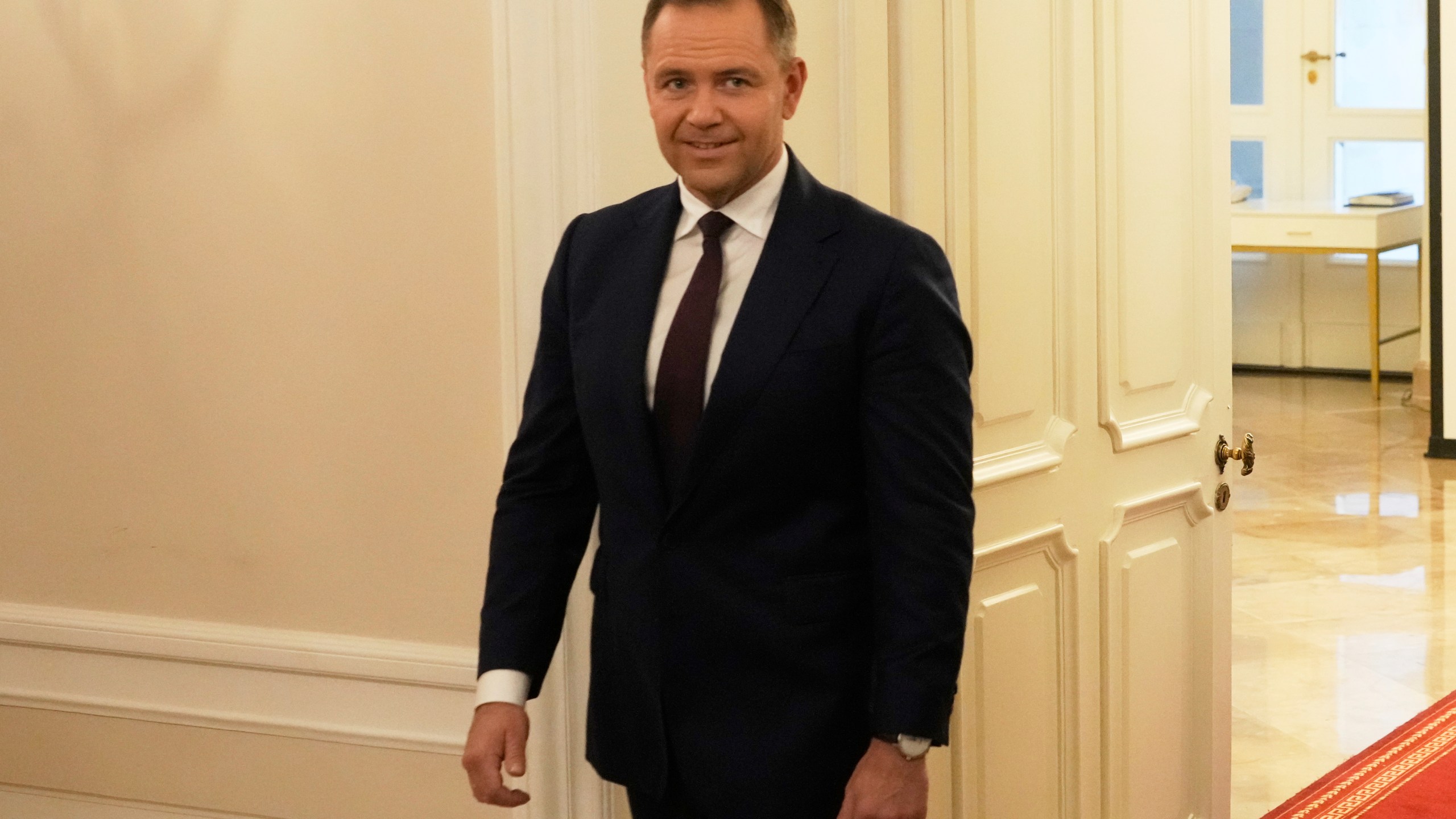 Poland's President Elect Karol Nawrocki arrives to meet with Poland's outgoing President Andrzej Duda at the Presidential Palace in Warsaw, Poland, Tuesday, June 3, 2025. (AP Photo/Czarek Sokolowski)