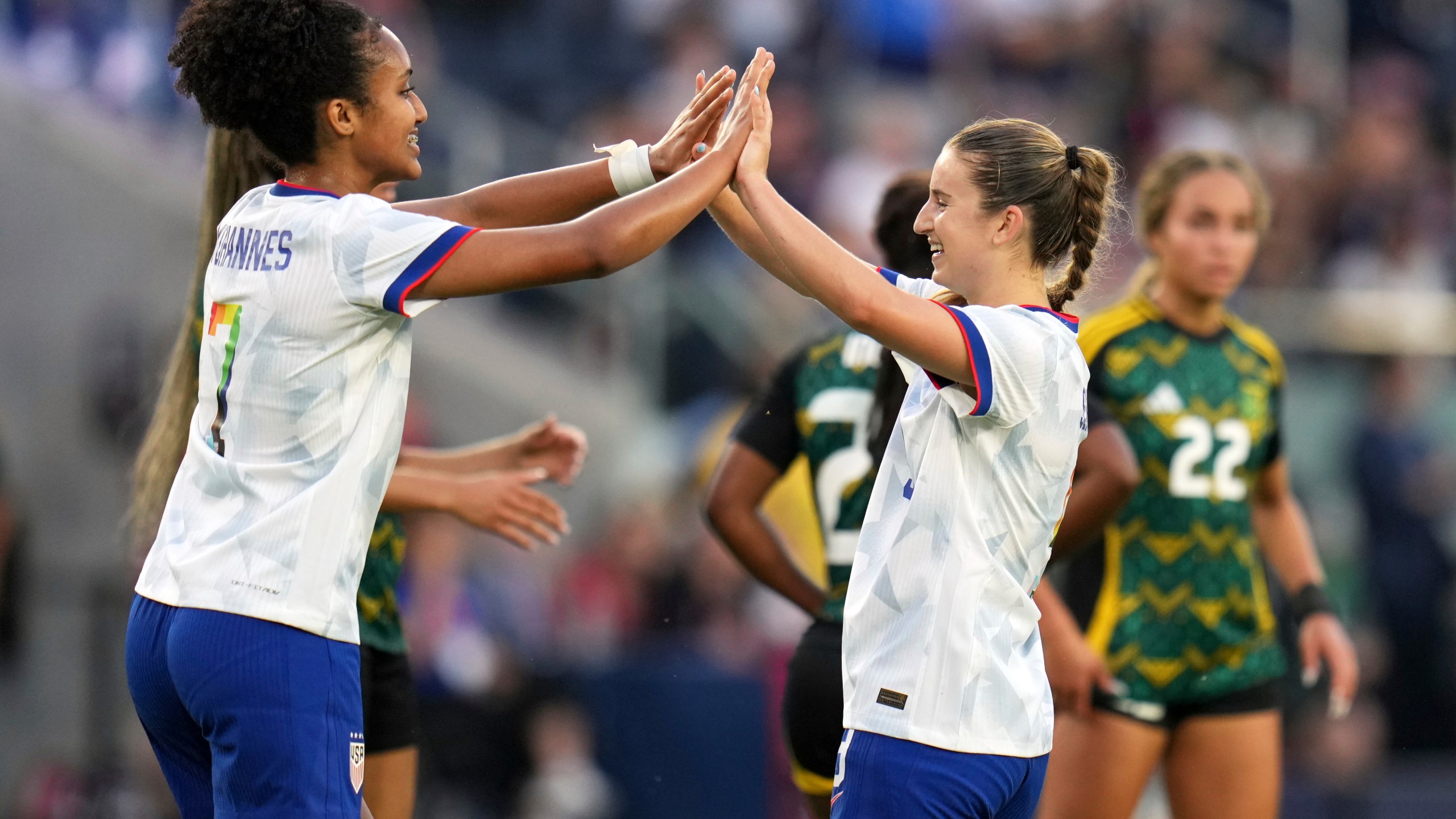 United States' Ally Sentnor, right, is congratulated by teammate Lily Yohannes after scoring during the first half of an international friendly soccer match against Jamaica Tuesday, June 3, 2025, in St. Louis. (AP Photo/Jeff Roberson)