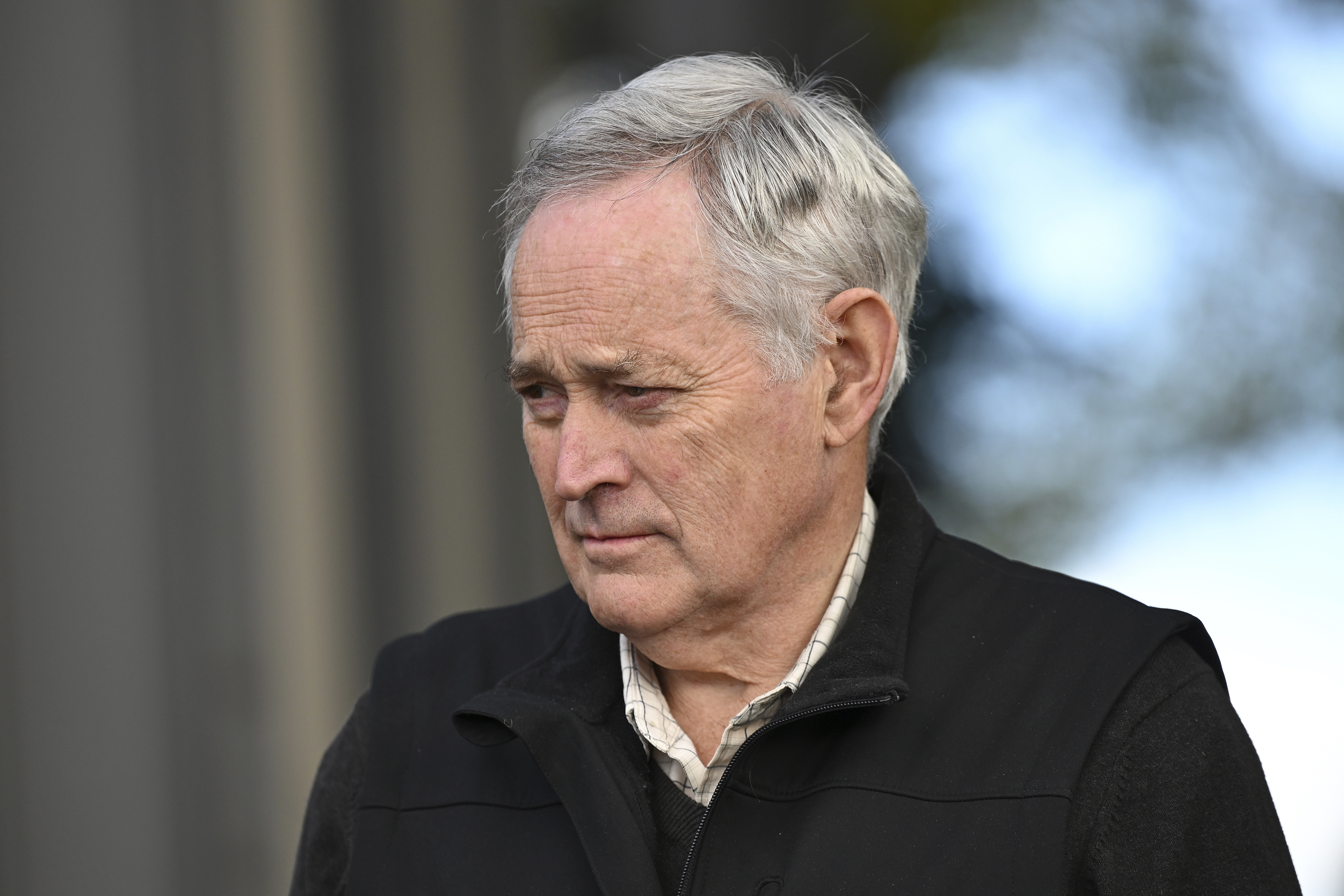 Ian Wilkinson departs the Latrobe Valley Magistrates Court in Morwell, Australia, Wednesday, June 4, 2025, during a break in a trial of a woman accused of his attempted murder. (James Ross/AAP Image via AP)