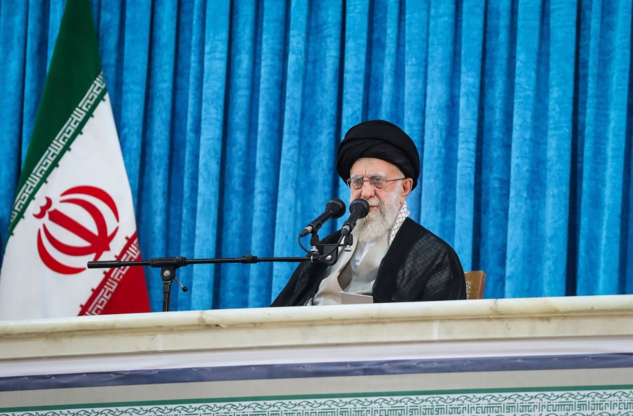 In this photo released by the official website of the office of the Iranian supreme leader, Supreme Leader Ayatollah Ali Khamenei attends a ceremony marking the anniversary of the 1989 death of the late revolutionary founder Ayatollah Khomeini at his shrine just outside Tehran, Iran, Wednesday, June 4, 2025. (Office of the Iranian Supreme Leader via AP)