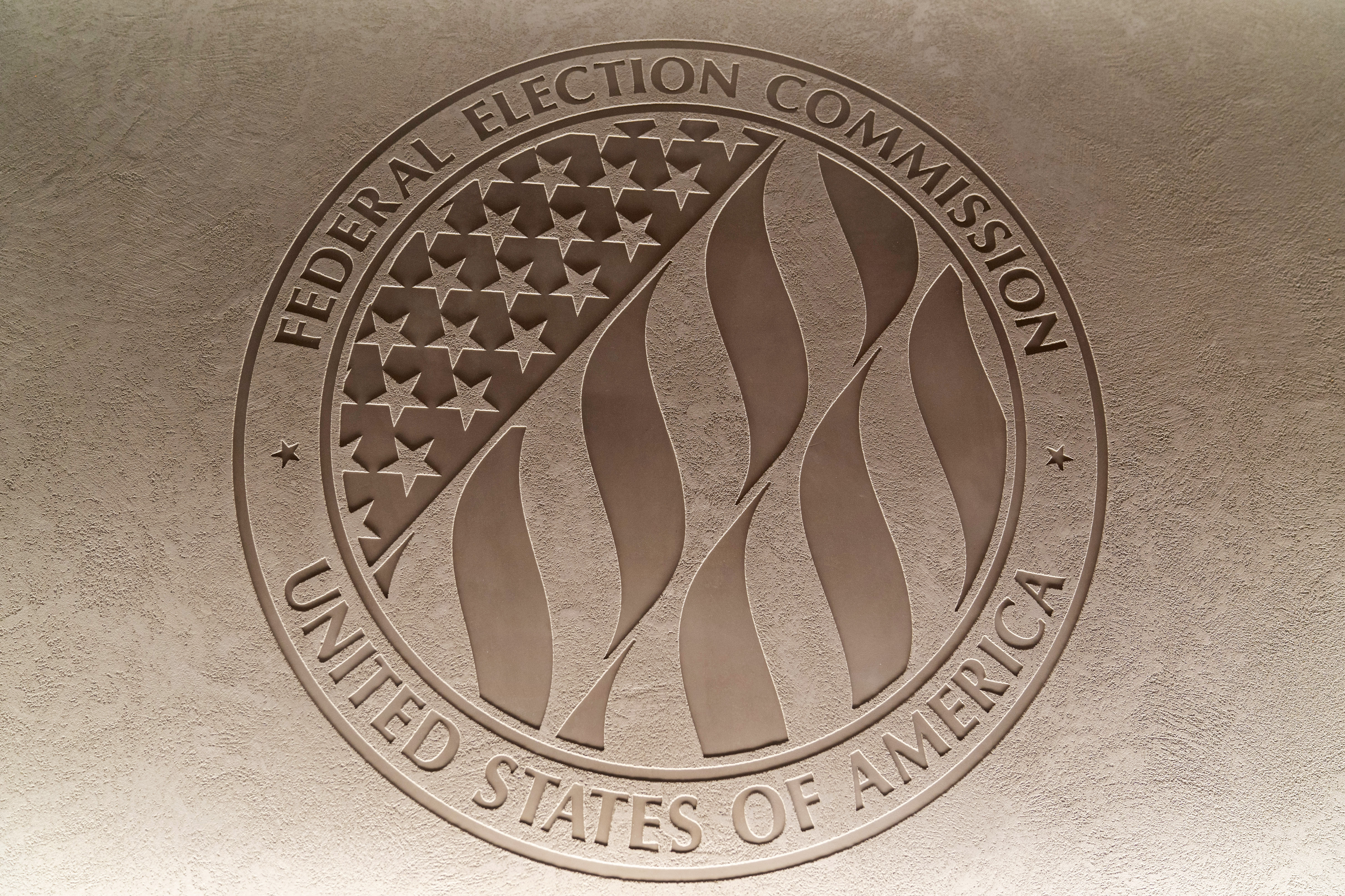 FILE - The Federal Election Commission emblem is seen at the Federal Election Commission headquarters in Washington, Aug. 10, 2023. (AP Photo/Stephanie Scarbrough, File)