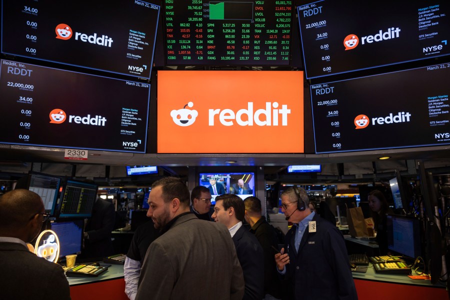 FILE - Reddit Inc. signage is seen on the New York Stock Exchange trading floor, prior to Reddit IPO, Thursday, March. 21, 2024. v(AP Photo/Yuki Iwamura, File)