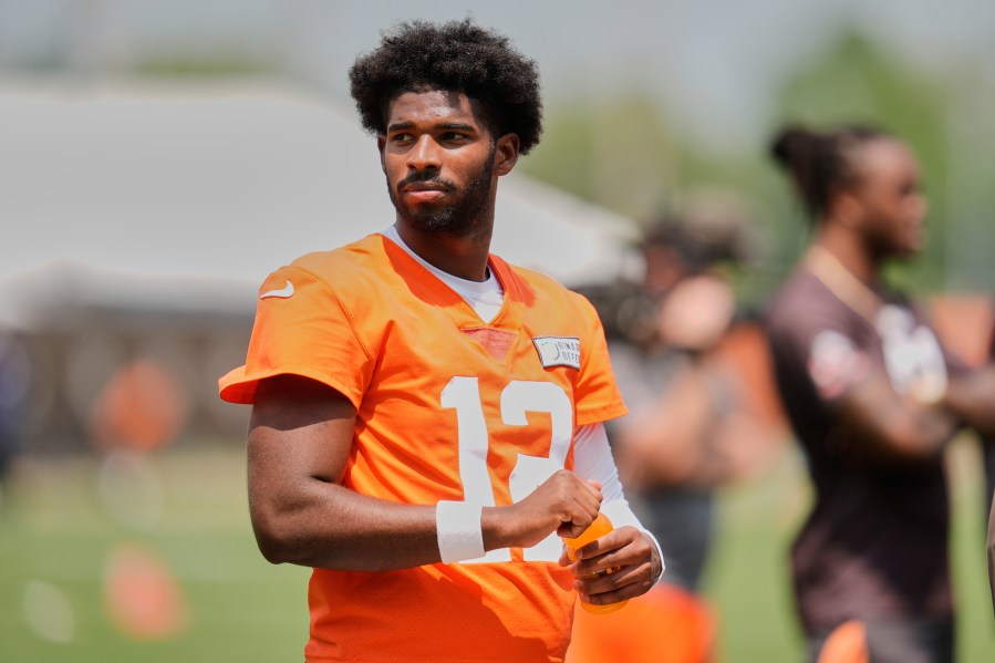 Cleveland Browns quarterback Shedeur Sanders (12) takes a break during NFL football practice in Berea, Ohio, Wednesday, June 4, 2025. (AP Photo/Sue Ogrocki)