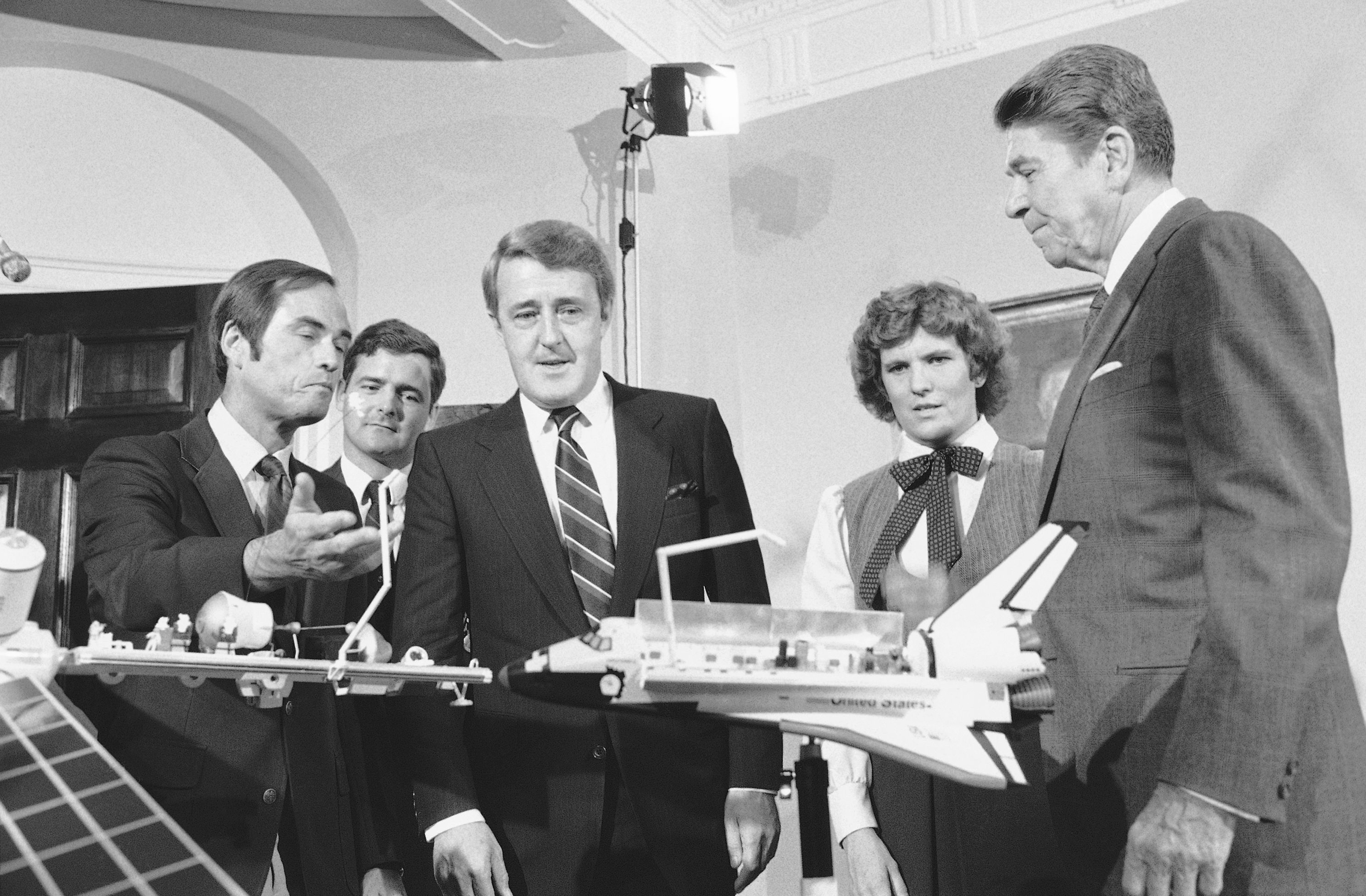 FILE - From left, mission commander Robert Crippen, Canadian astronaut Dr. Marc Garneau, Canadian Prime Minister Brian Mulroney and astronaut Kathy Sullivan meet with President Ronald Reagan in the White House in Washington on Sept. 25, 1984. (AP Photo/Barry Thumma, File)