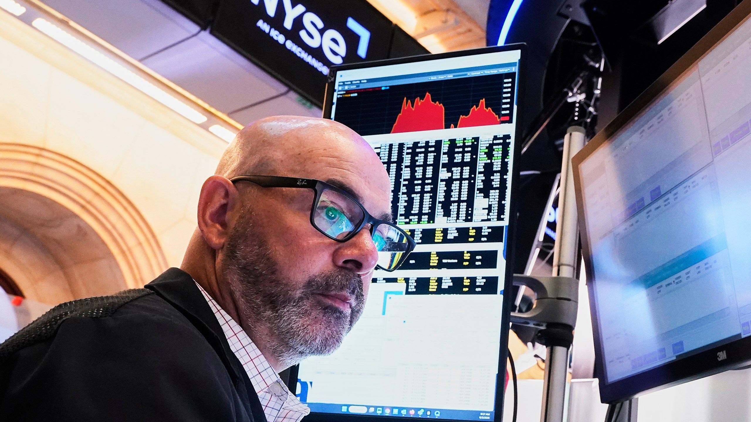 Trader Fred Demarco works on the floor of the New York Stock Exchange, Tuesday, June 3, 2025. (AP Photo/Richard Drew)
