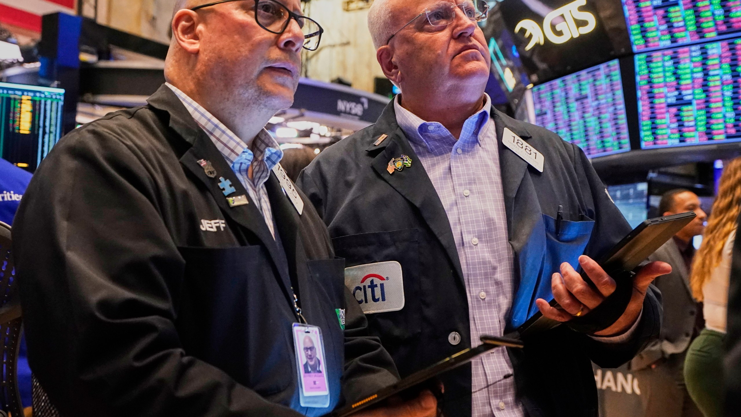 Traders Jeffrey Vazquez, left, and Thomas Ferrigno work on the floor of the New York Stock Exchange, Thursday, June 5, 2025. (AP Photo/Richard Drew)