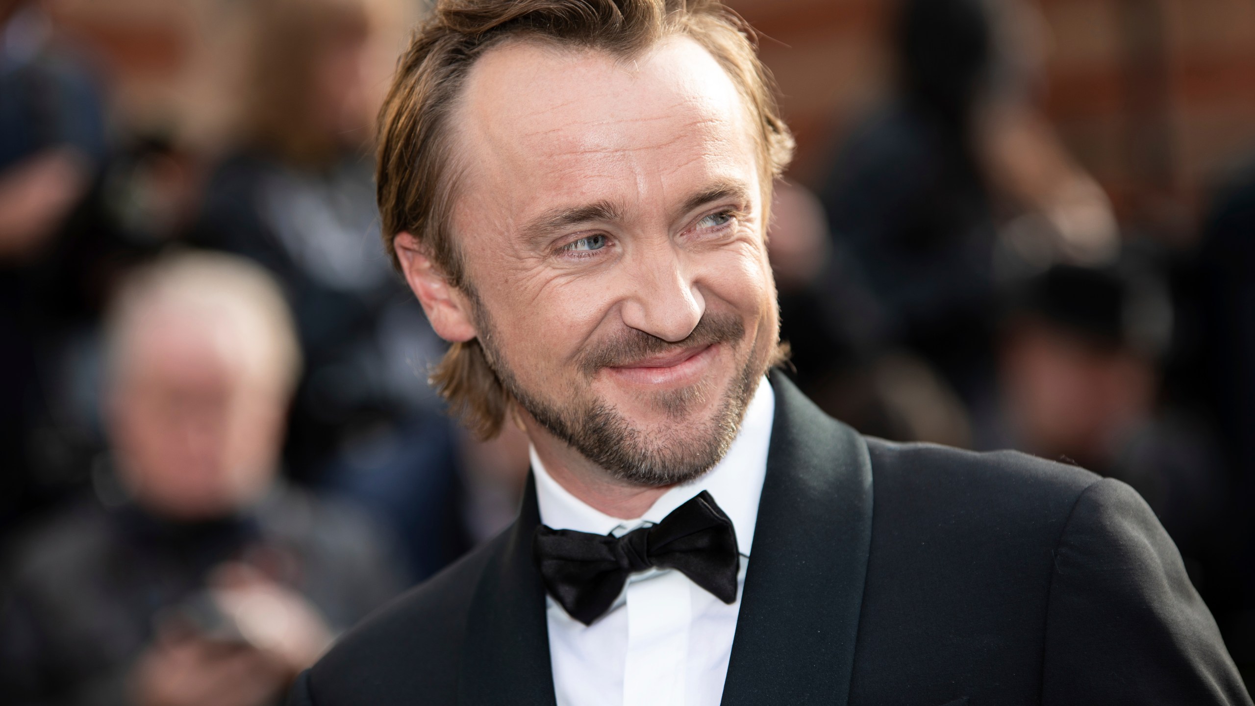 FILE - Tom Felton poses for photographers upon arrival at the Olivier Awards in London, Sunday, April 10, 2022. (Photo by Vianney Le Caer/Invision/AP, File)