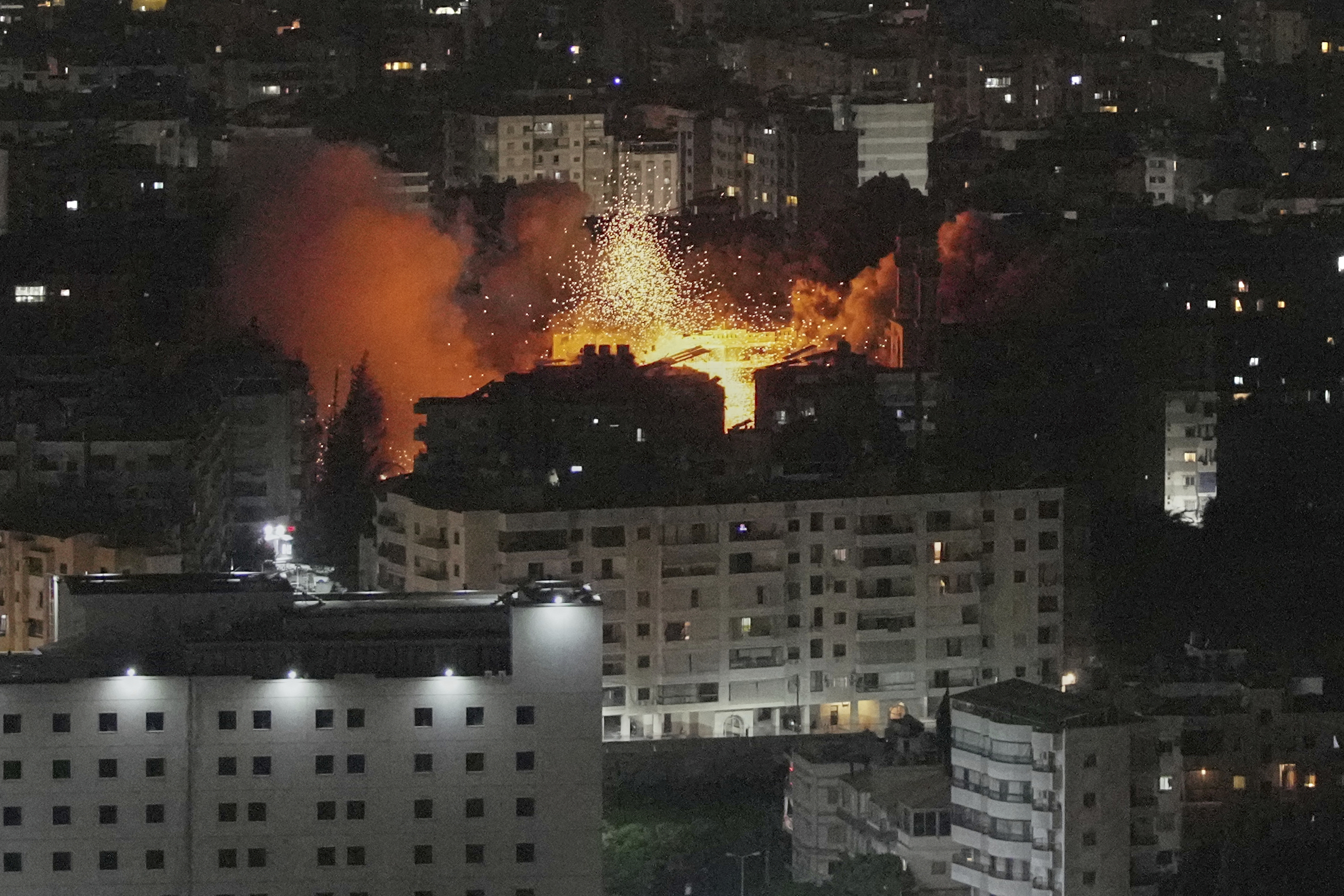 Flames and smoke rise following an Israeli airstrike on Dahiyeh in the southern suburb of Beirut, Lebanon, Thursday, June 5, 2025. (AP Photo/Hassan Ammar)
