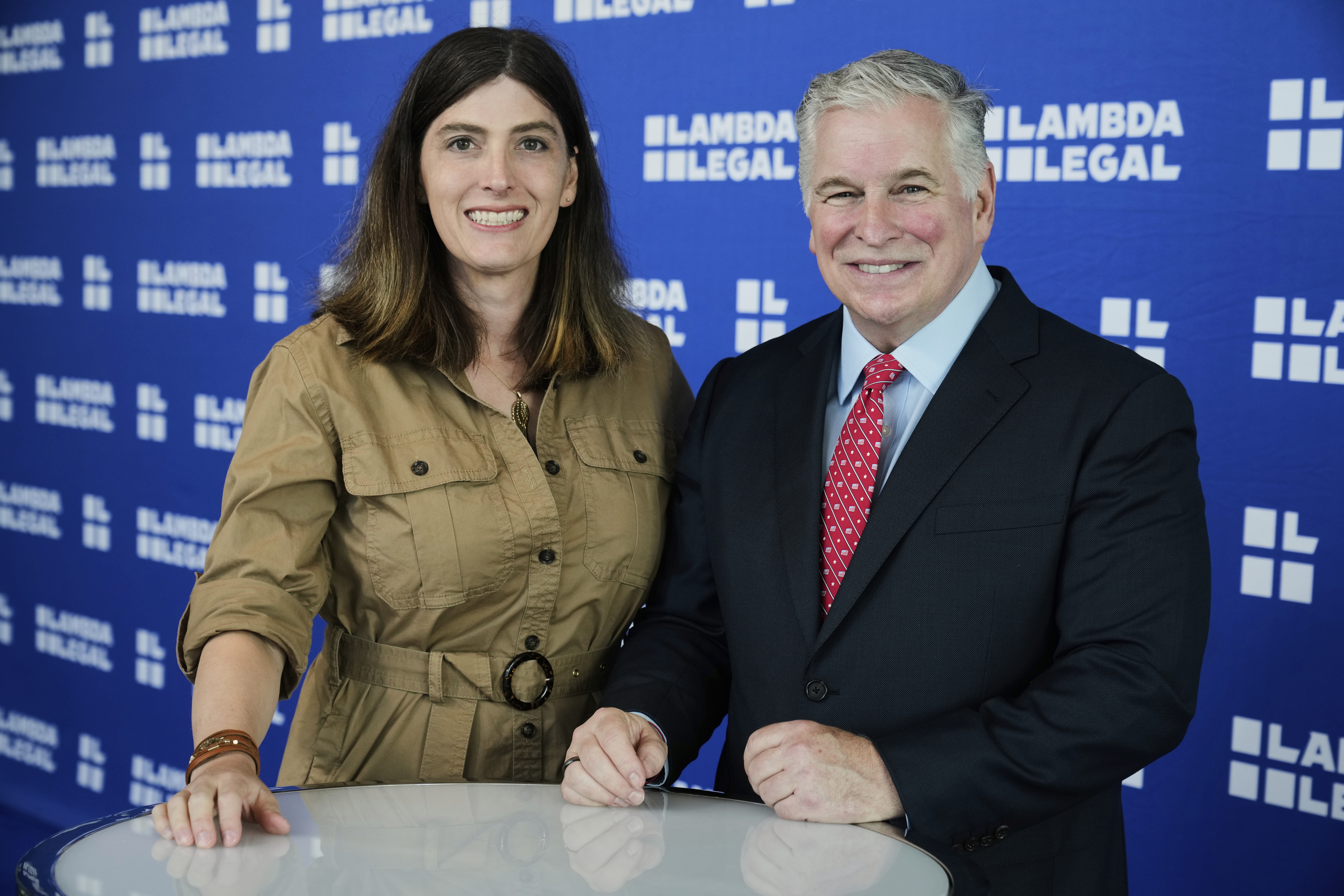 U.S. Navy Commander Emily Shilling, left, and Lambda Legal CEO Kevin Jennings pose for a photo before the Liberty Awards National Dinner, in New York, Thursday, June 5, 2025. (AP Photo/Richard Drew)
