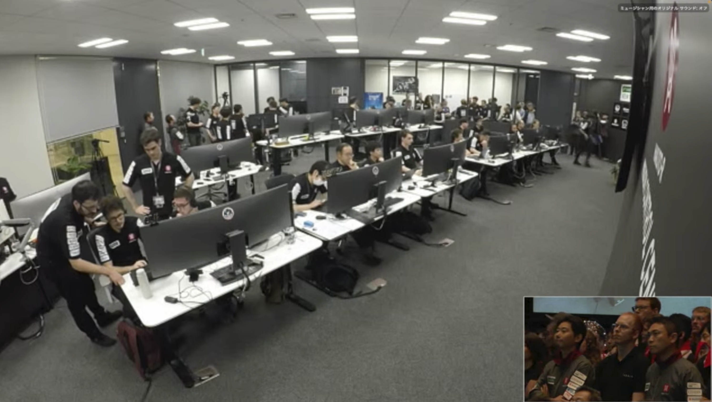 This image taken from video shows flight controllers at ispace Mission Control in Tokyo awaiting confirmation of their private lunar lander touching down on the moon Friday, June 6, 2025. (ispace via AP)