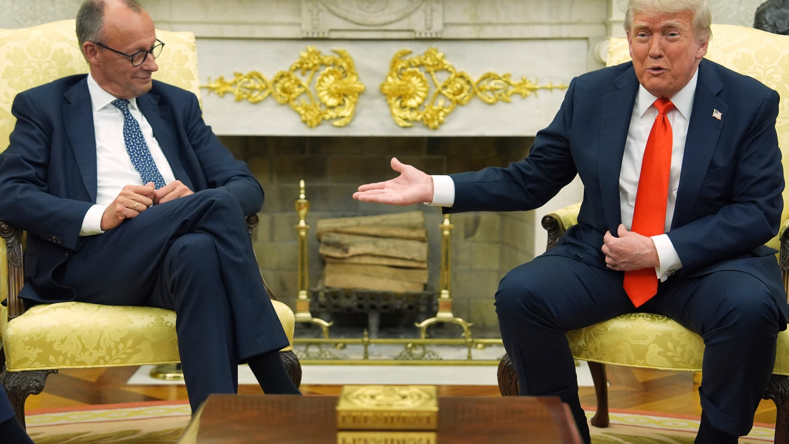 President Donald Trump, right, meets Germany's Chancellor Friedrich Merz in the Oval Office of the White House, Thursday, June 5, 2025, in Washington. (AP Photo/Evan Vucci)