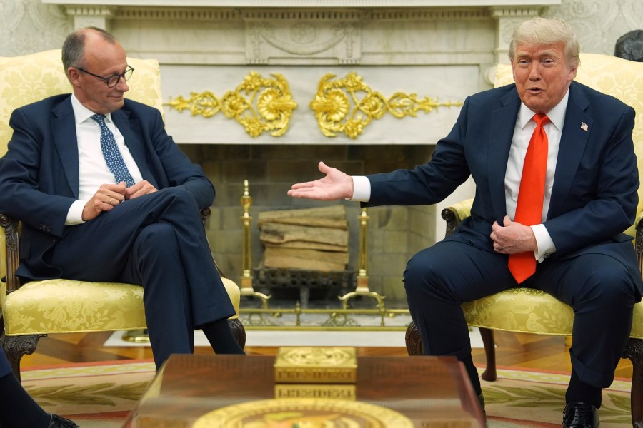 President Donald Trump, right, meets Germany's Chancellor Friedrich Merz in the Oval Office of the White House, Thursday, June 5, 2025, in Washington. (AP Photo/Evan Vucci)