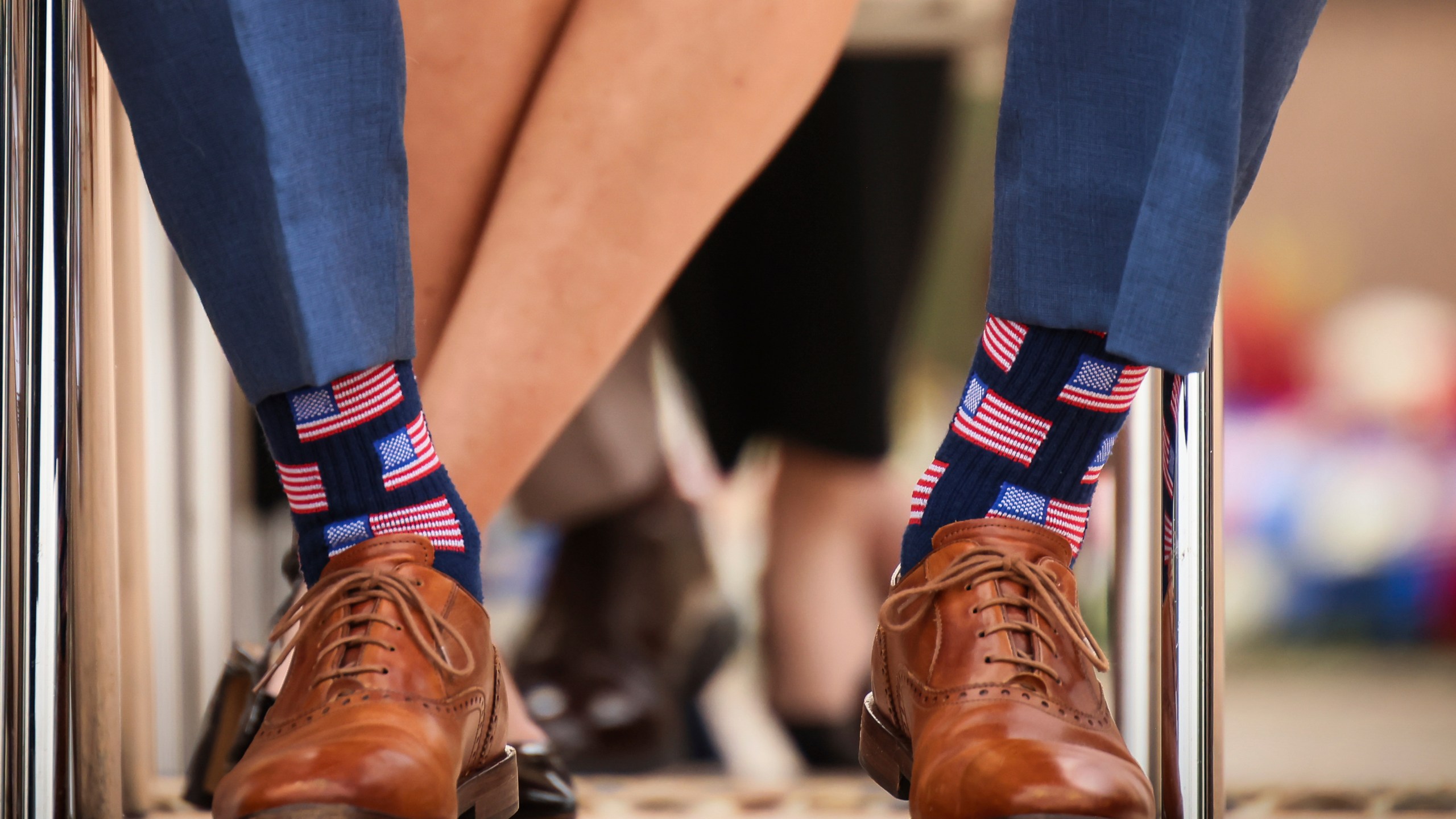 U.S. Defense Secretary Pete Hegseth wears socks showing the American flag during a ceremony at the US cemetery to commemorate the 81st anniversary of the D-Day landings, Friday, June 6, 2025 in Colleville-sur-Mer, Normandy. (AP Photo/Thomas Padilla)