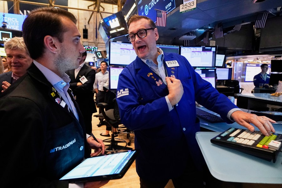Trader Dylan Halvorsan, left, and specialist Patrick King work on the floor of the New York Stock Exchange, Thursday, June 5, 2025. (AP Photo/Richard Drew)