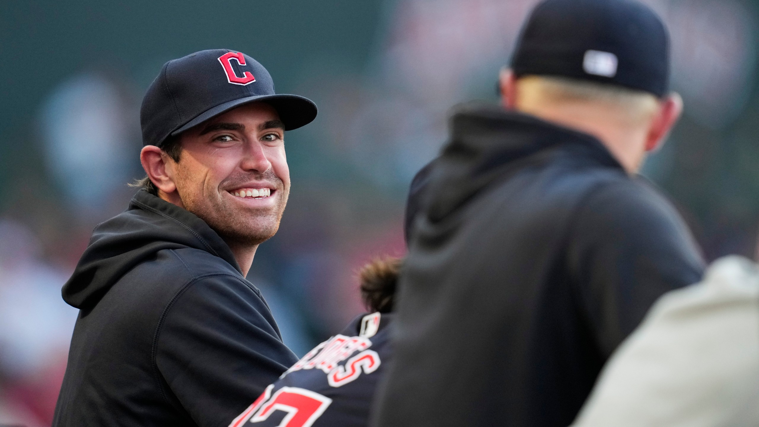 FILE - Cleveland Guardians' Shane Bieber stands in the dugout during the third inning of a baseball game against the Los Angeles Angels in Anaheim, Calif., May 25, 2024. (AP Photo/Ashley Landis, file)