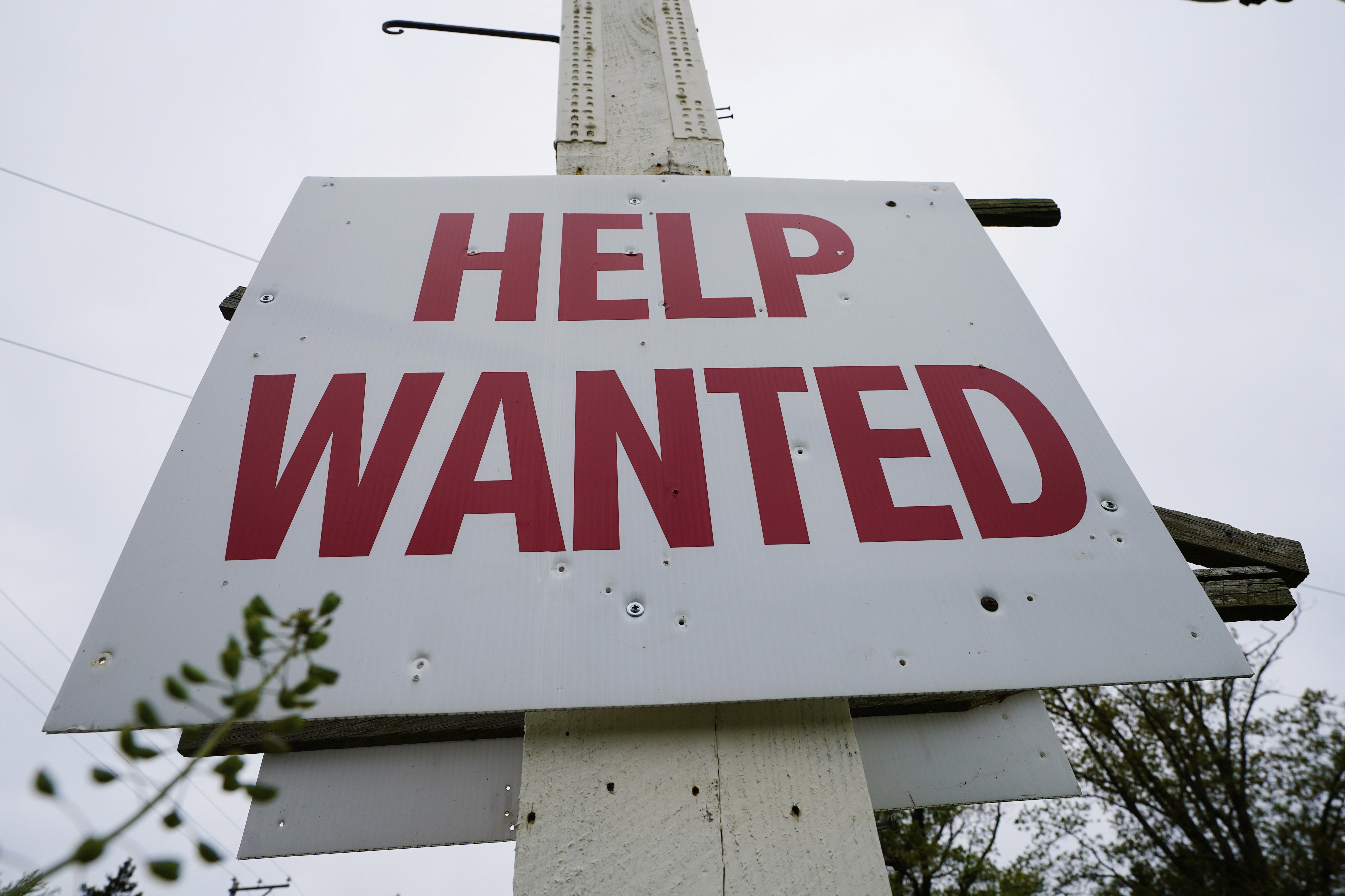 FILE - A help wanted sign is posted in Lansdale, Pa., Friday, April 28, 2023. (AP Photo/Matt Rourke, File)
