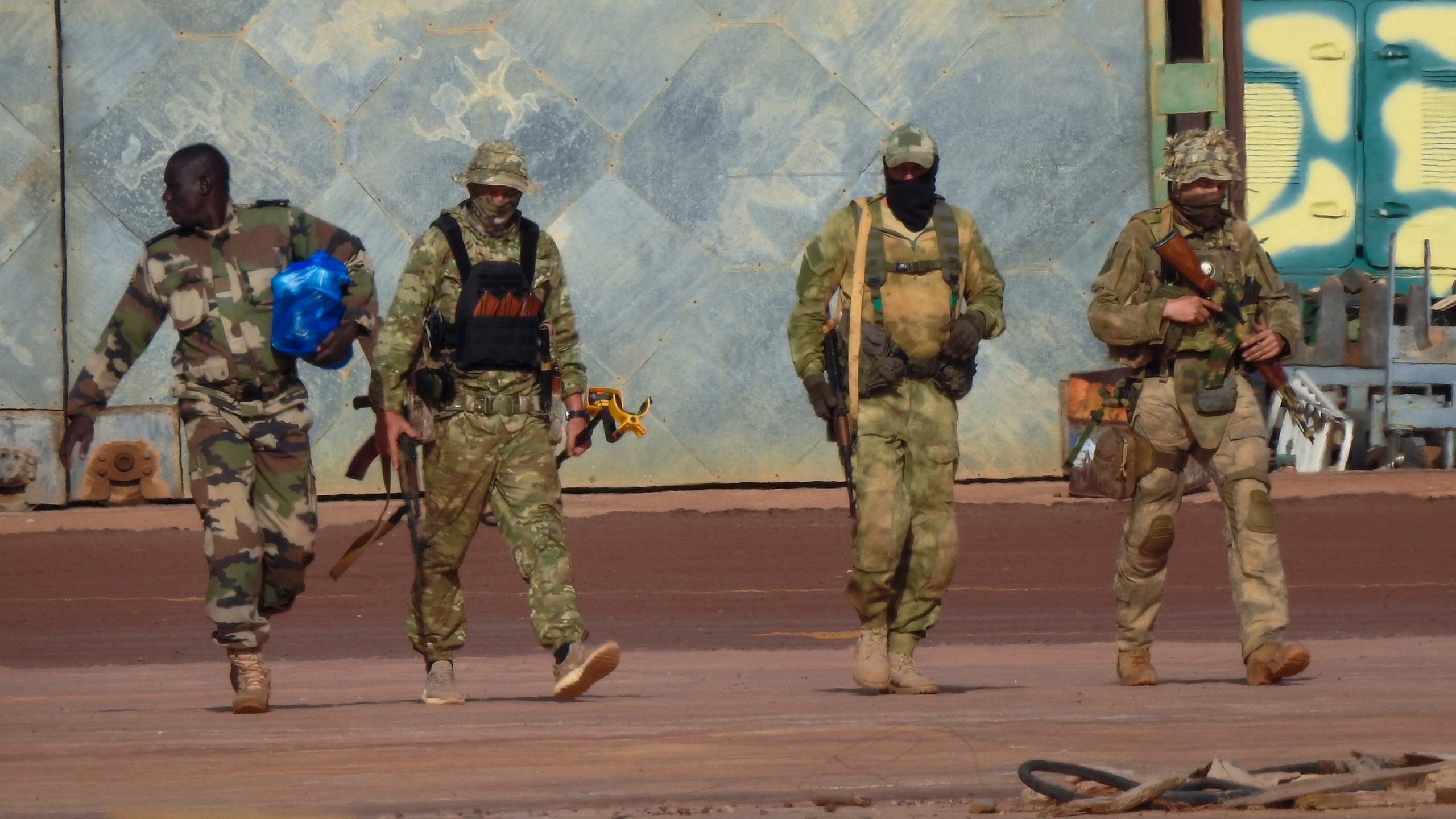 FILE - This undated photograph provided by the French Army shows three Russian mercenaries in northern Mali. (French Army via AP, File)