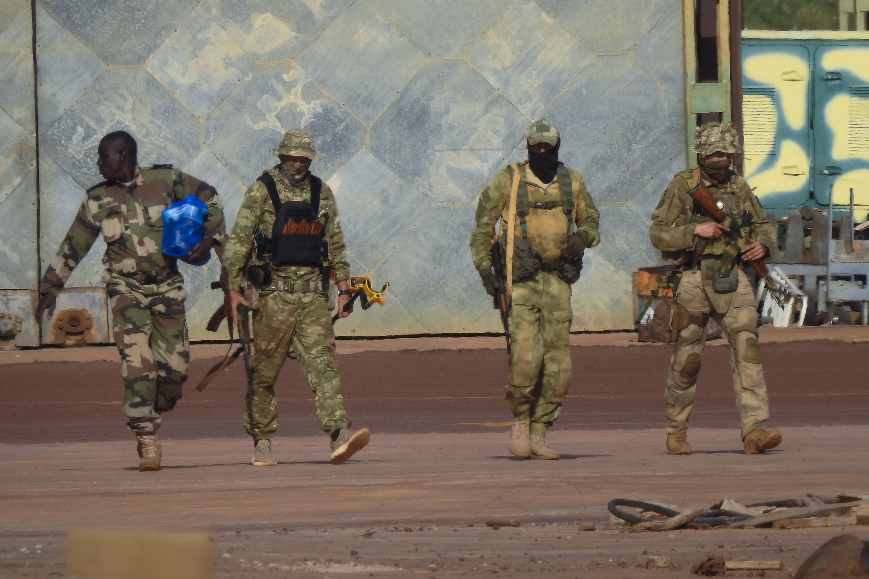 FILE - This undated photograph provided by the French Army shows three Russian mercenaries in northern Mali. (French Army via AP, File)