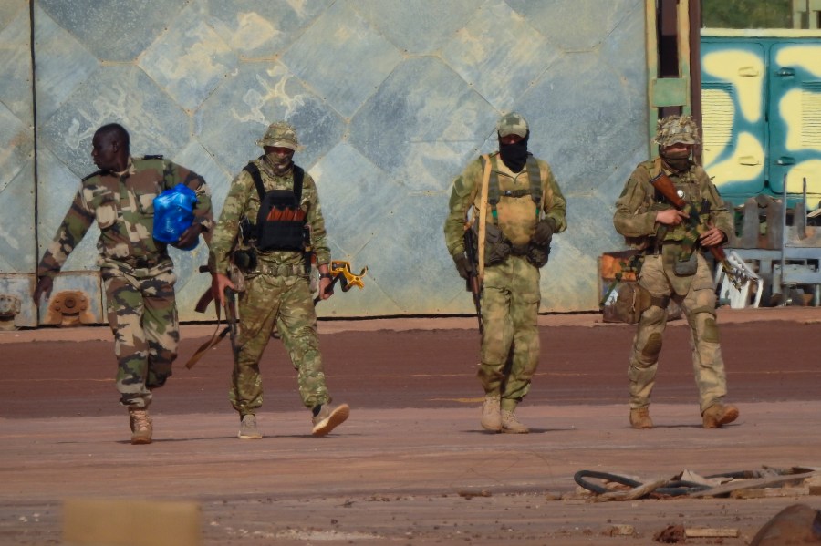 FILE - This undated photograph provided by the French Army shows three Russian mercenaries in northern Mali. (French Army via AP, File)
