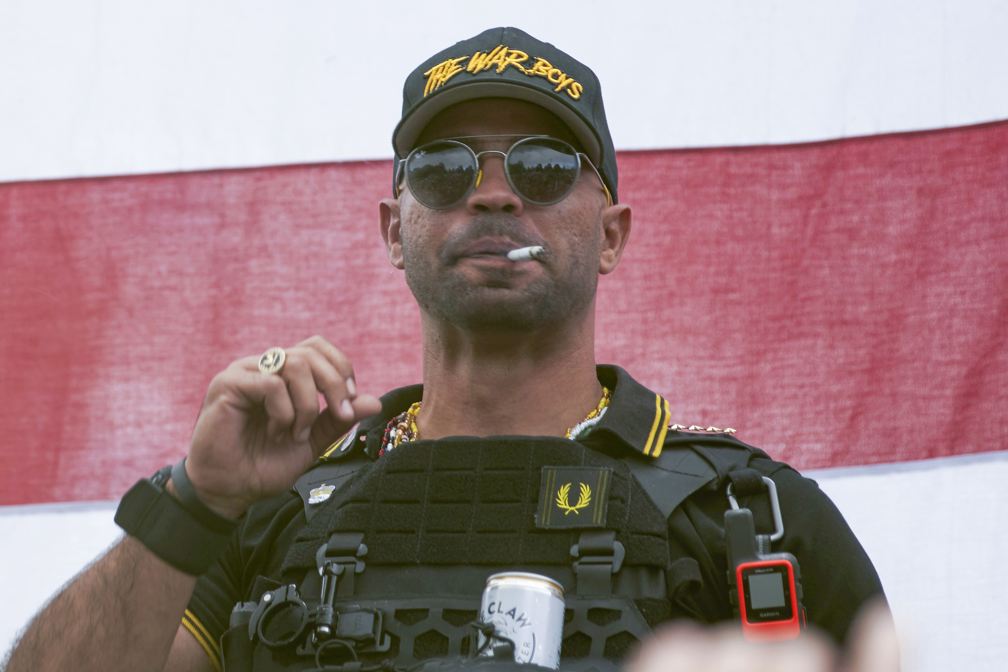 FILE - Proud Boys leader Henry "Enrique" Tarrio is seen during a rally organized by the Proud Boys in Portland, Ore., on Sept. 26, 2020. (AP Photo/Allison Dinner, File)