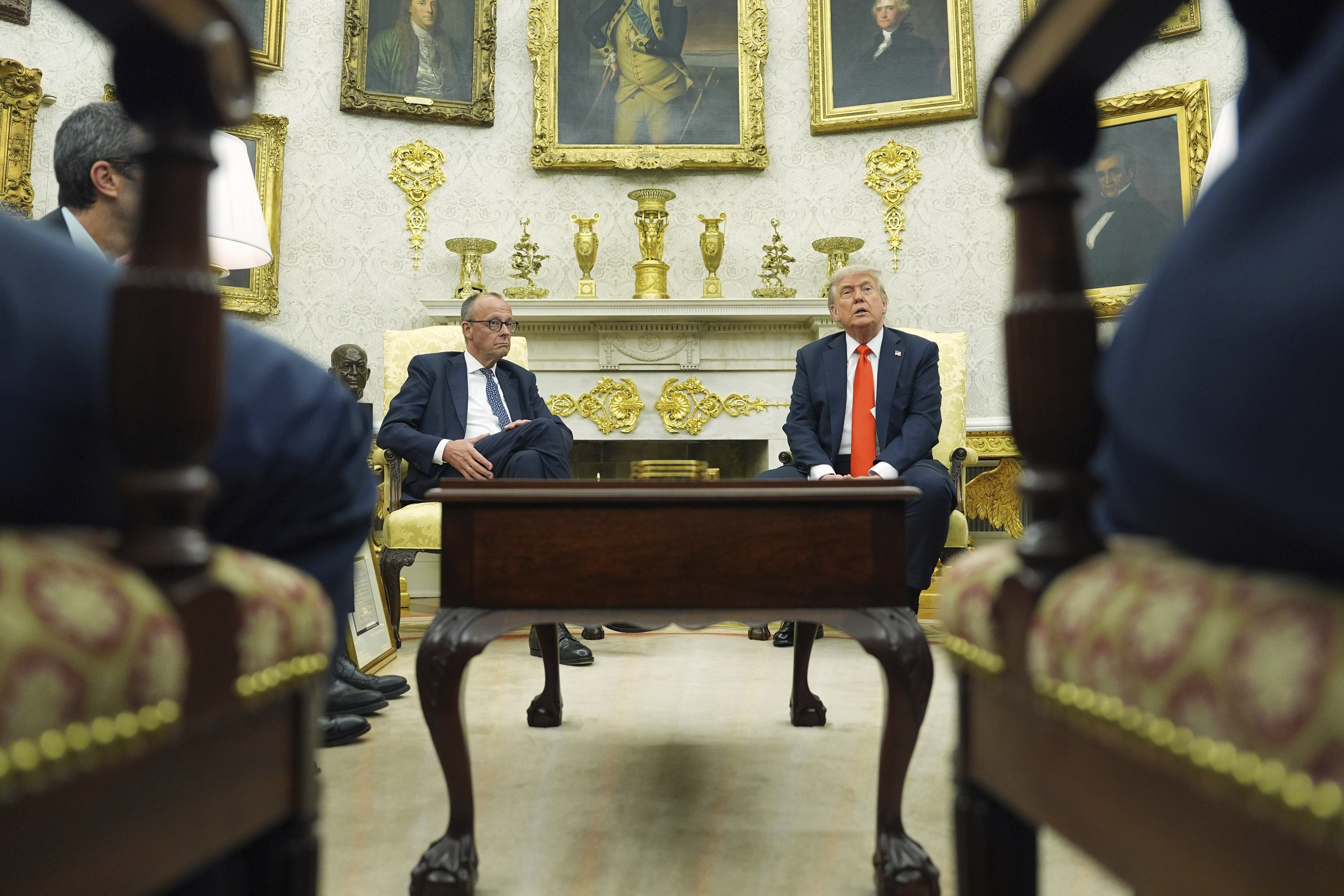 President Donald Trump, right, meets Germany's Chancellor Friedrich Merz in the Oval Office of the White House, Thursday, June 5, 2025, in Washington. (AP Photo/Evan Vucci)