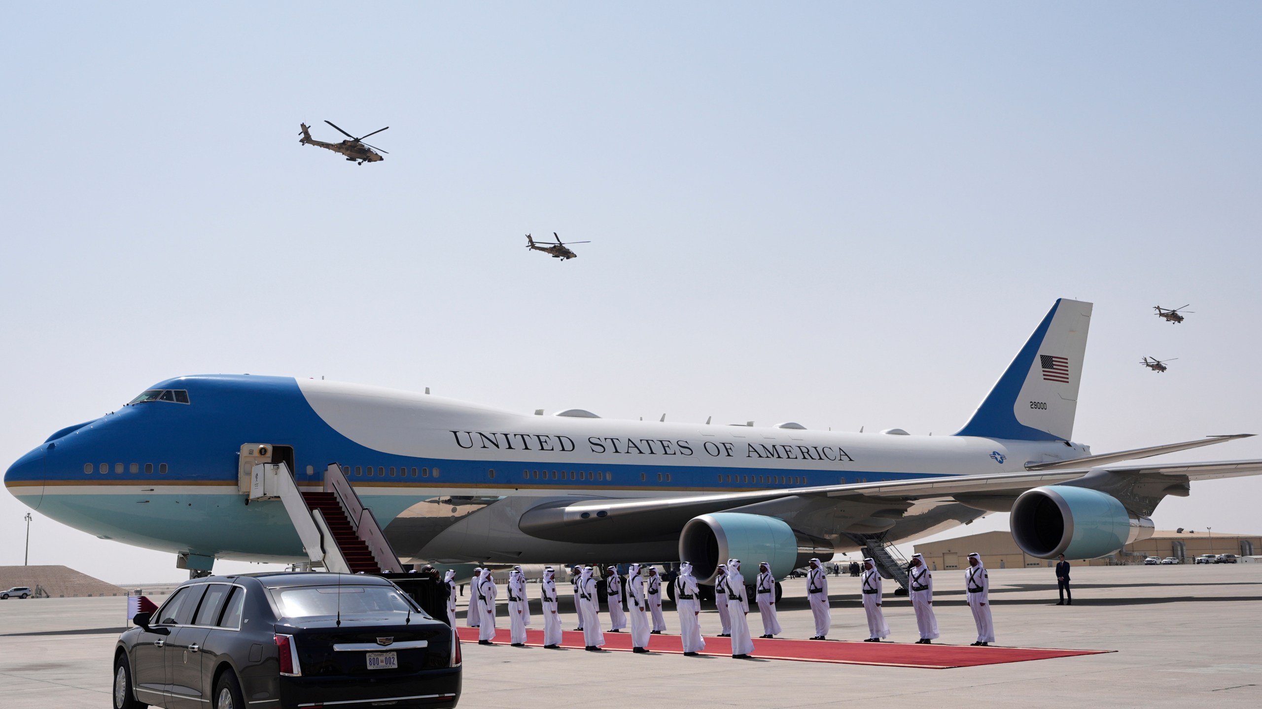 Qatar Air Force Apache gunships perform a flyover as Air Force One is ready to depart from Al Udeid Air Base, Thursday, May 15, 2025, in Doha, Qatar. (AP Photo/Alex Brandon)