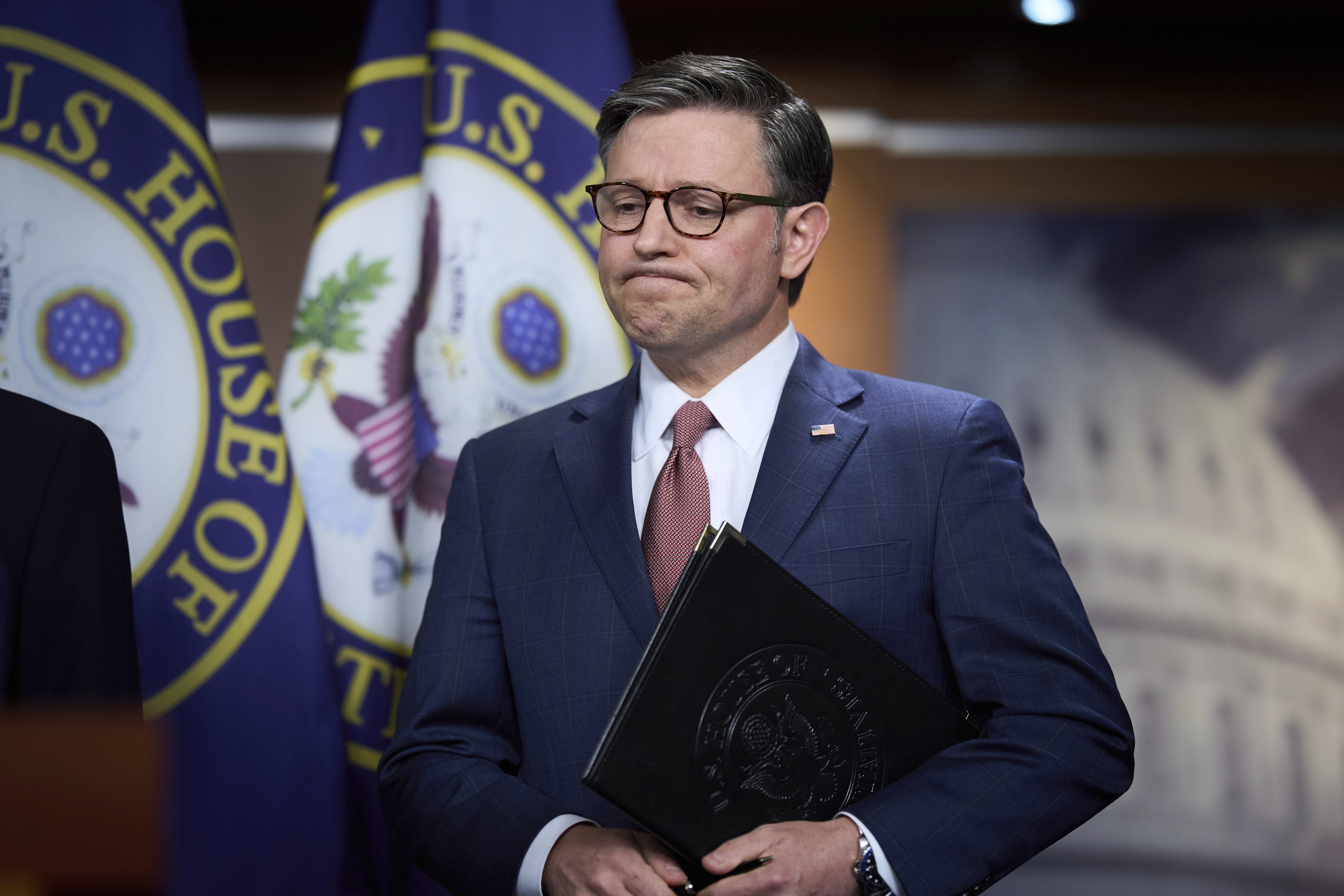 Speaker of the House Mike Johnson, R-La., pauses as he meets with reporters to discuss work on President Donald Trump's bill of tax breaks and spending cuts, at the Capitol in Washington, Wednesday, June 4, 2025. (AP Photo/J. Scott Applewhite)