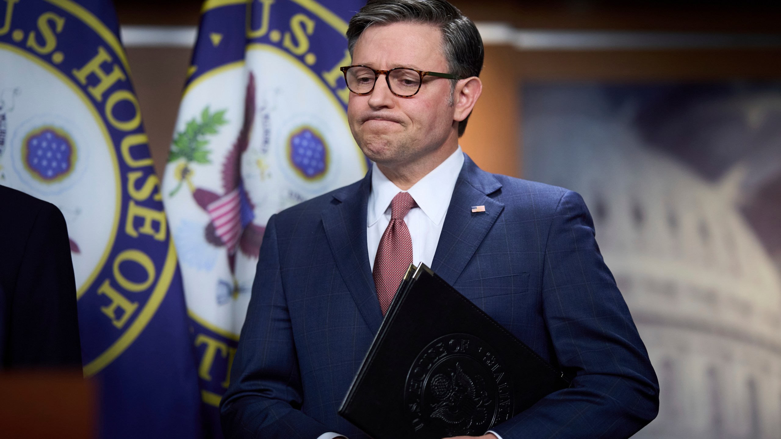 Speaker of the House Mike Johnson, R-La., pauses as he meets with reporters to discuss work on President Donald Trump's bill of tax breaks and spending cuts, at the Capitol in Washington, Wednesday, June 4, 2025. (AP Photo/J. Scott Applewhite)