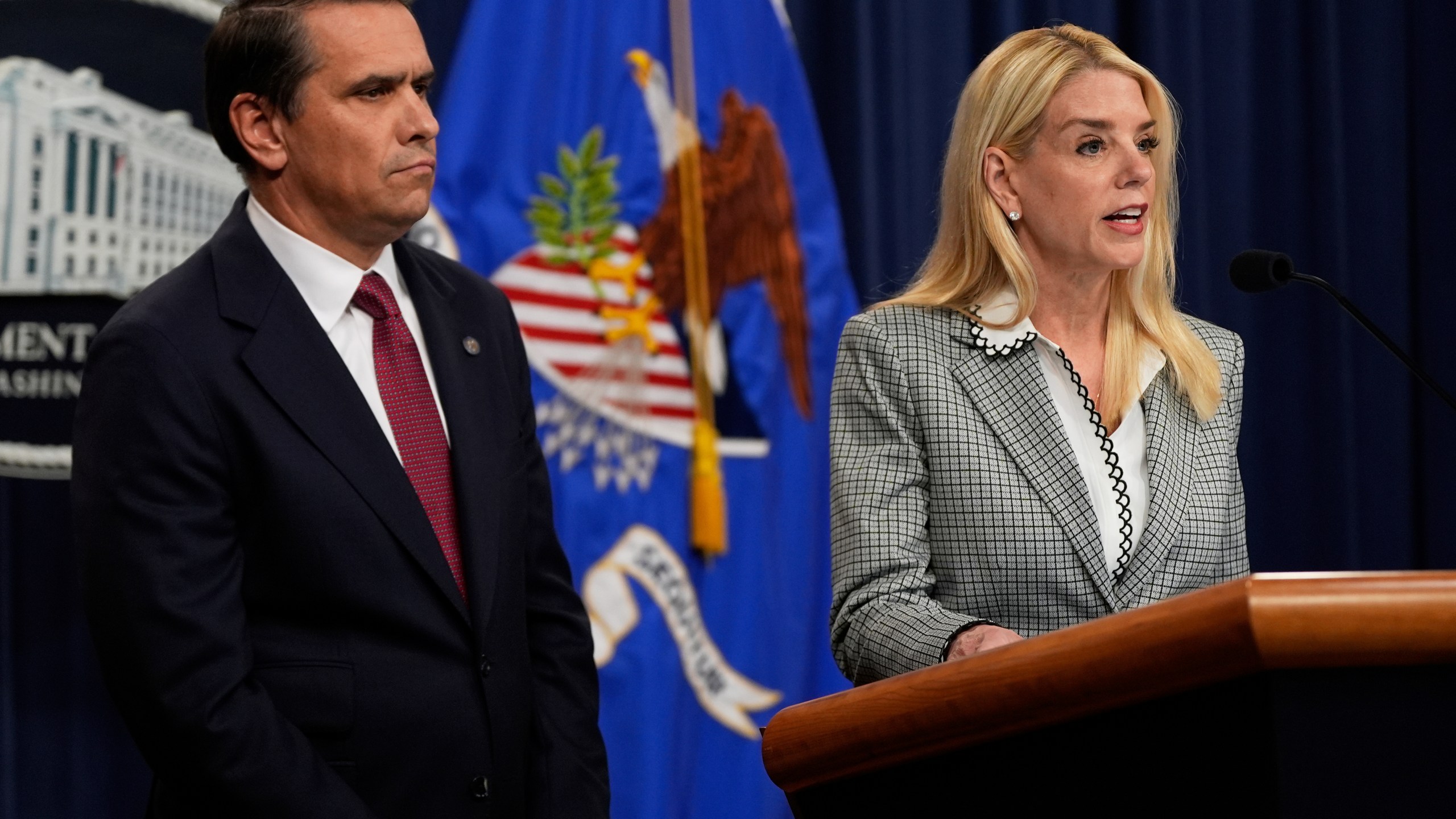 Attorney General Pam Bondi speaks as Deputy Attorney General Todd Blanche listens during a news conference about Kilmar Abrego Garcia at the Justice Department, Friday June 6, 2025, in Washington. (AP Photo/Julia Demaree Nikhinson)
