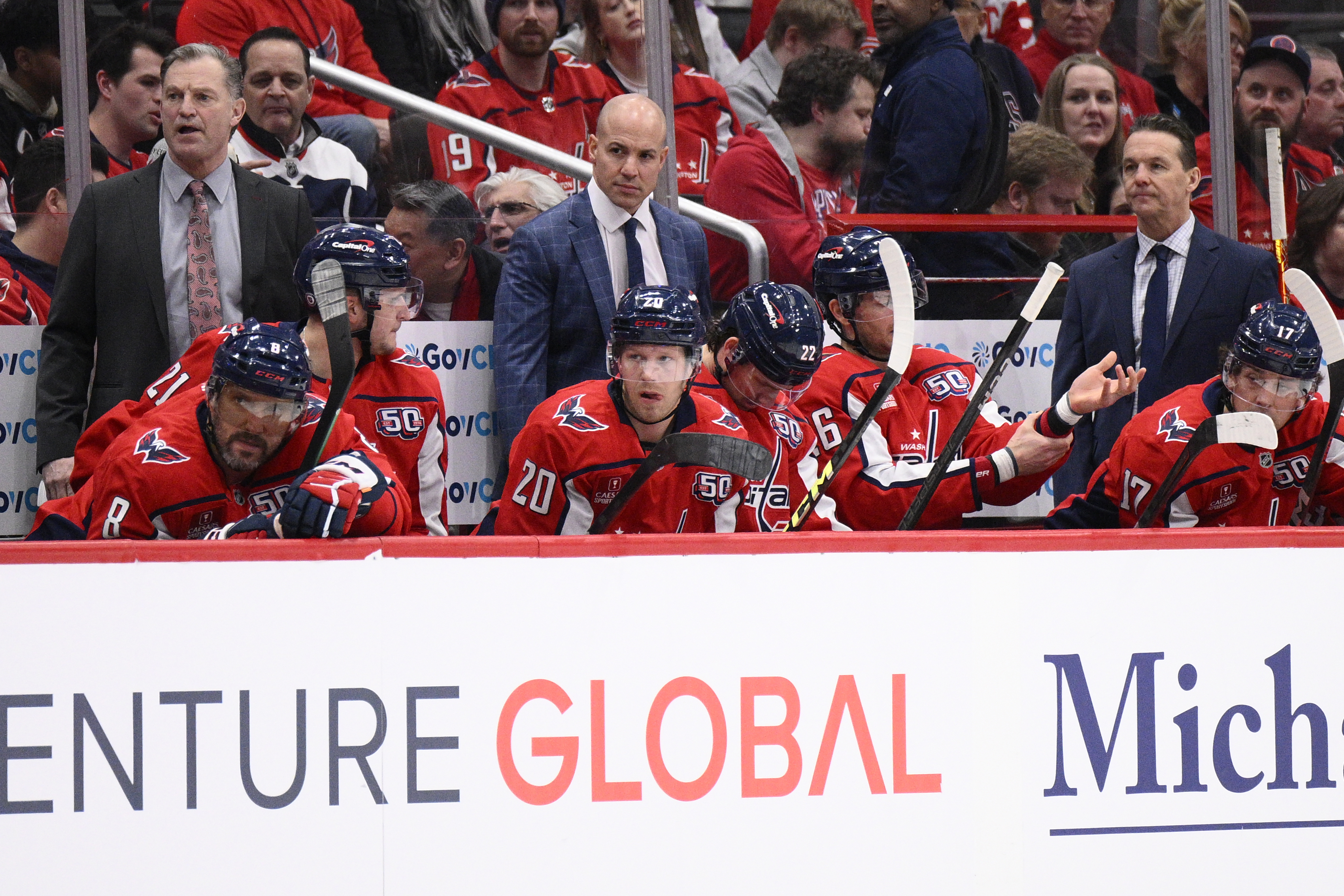 FILE - Washington Capitals head coach Spencer Carbery, center, in action during the first period of an NHL hockey game against the Detroit Red Wings, Friday, March 7, 2025, in Washington. (AP Photo/Nick Wass, File)