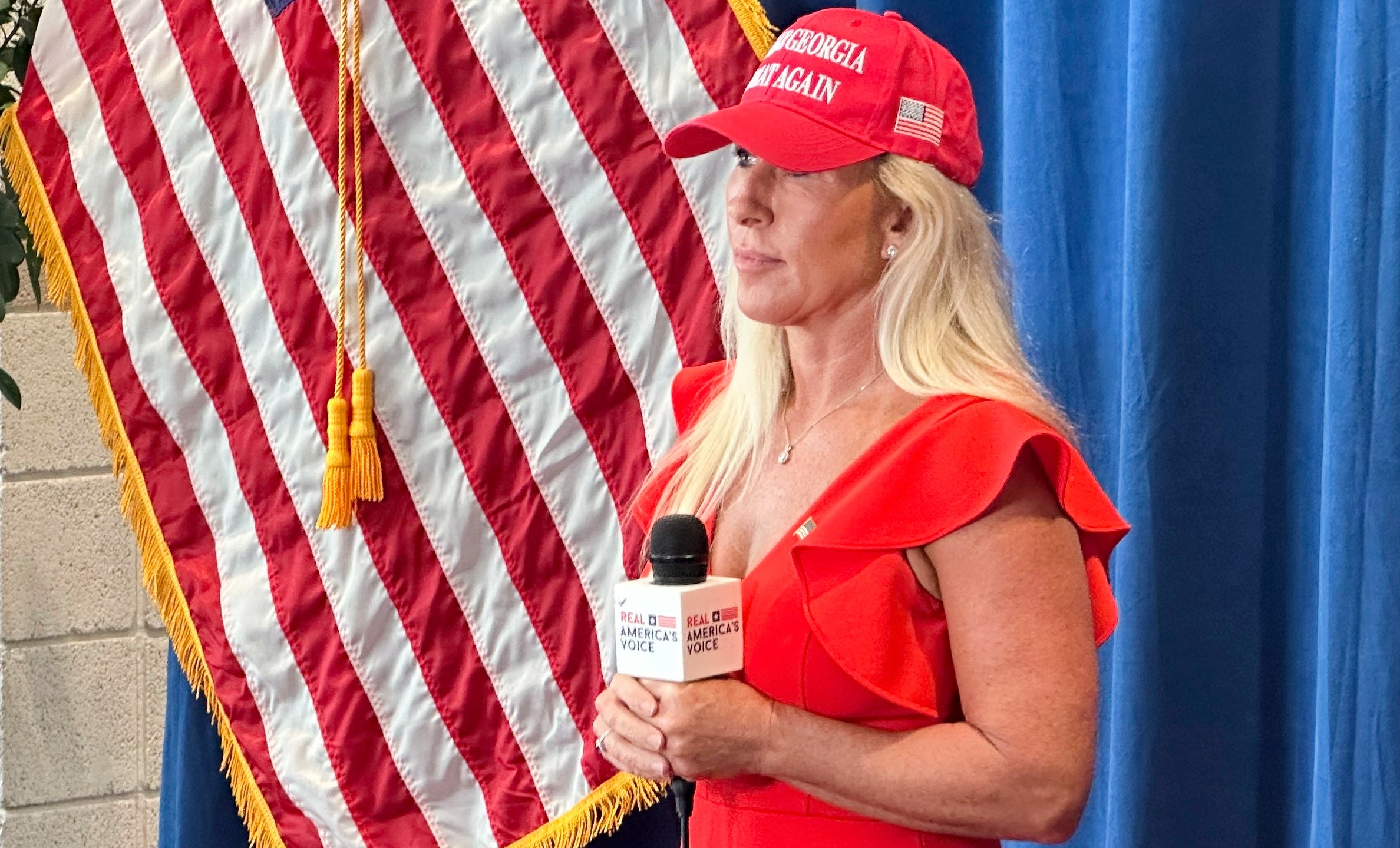 U.S. Rep. Marjorie Taylor Greene, R-Ga., waits for a video interview at the Georgia Republican Convention in Dalton, Ga., Saturday, June 7, 2025. (AP Photo/Jeff Amy)