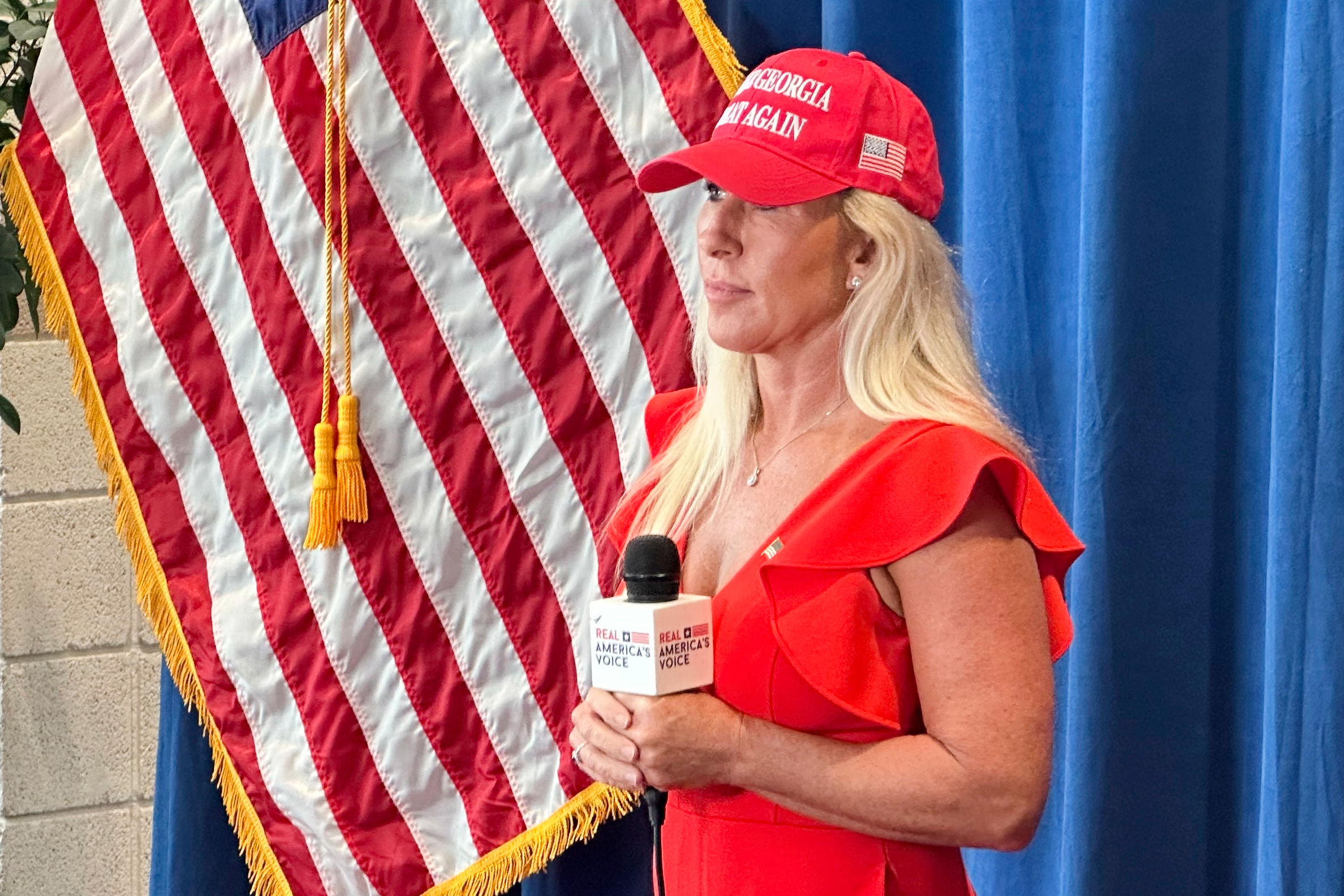 U.S. Rep. Marjorie Taylor Greene, R-Ga., waits for a video interview at the Georgia Republican Convention in Dalton, Ga., Saturday, June 7, 2025. (AP Photo/Jeff Amy)