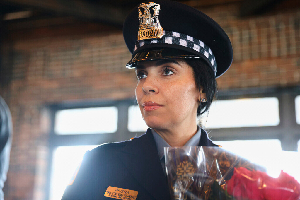 Newly graduated police officer Krystal Rivera talks about why she decided to become an officer after a graduation ceremony, Wednesday, Oct. 20, 2021, at Navy Pier in Chicago. (Anthony Vazquez/Chicago Sun-Times via AP)