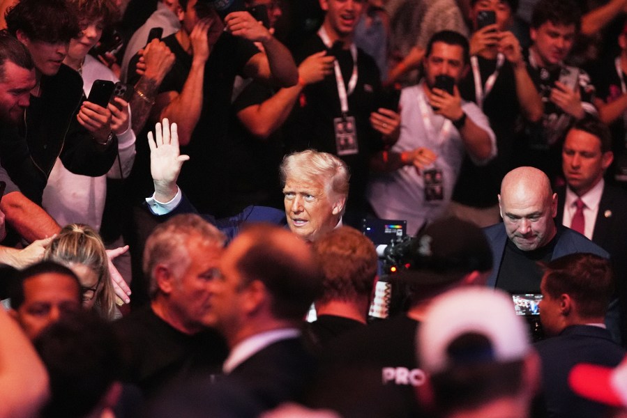 President Donald Trump attends the UFC-316 mixed martial arts event, at the Prudential Center, Saturday, June 7, 2025, in Newark, N.J., withUFC's Dana White, right. (AP Photo/Frank Franklin II)