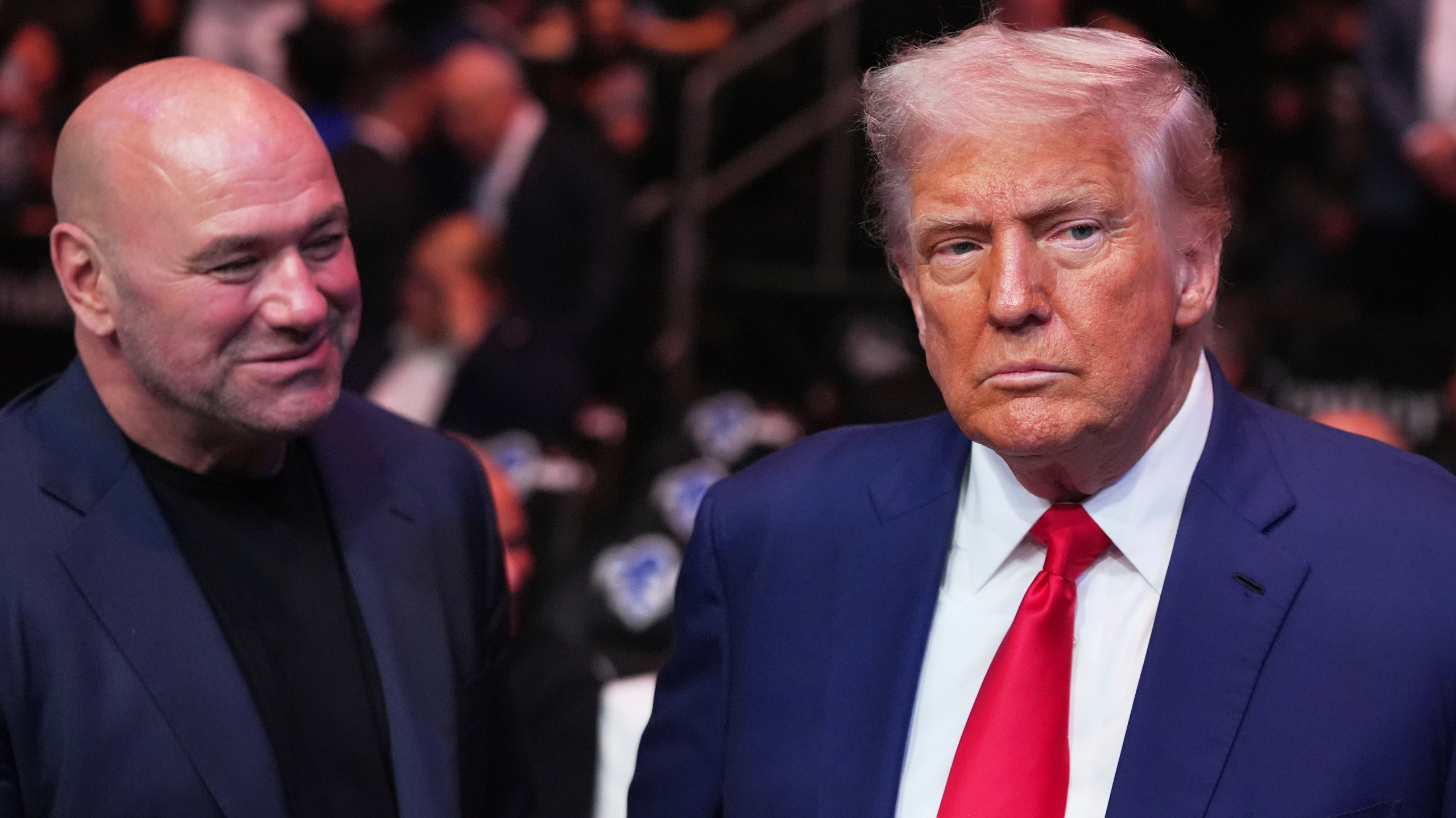 President Donald Trump attends the UFC-316 mixed martial arts event, at the Prudential Center, Saturday, June 7, 2025, in Newark, N.J., as UFC's Dana White, looks on. (AP Photo/Frank Franklin II)