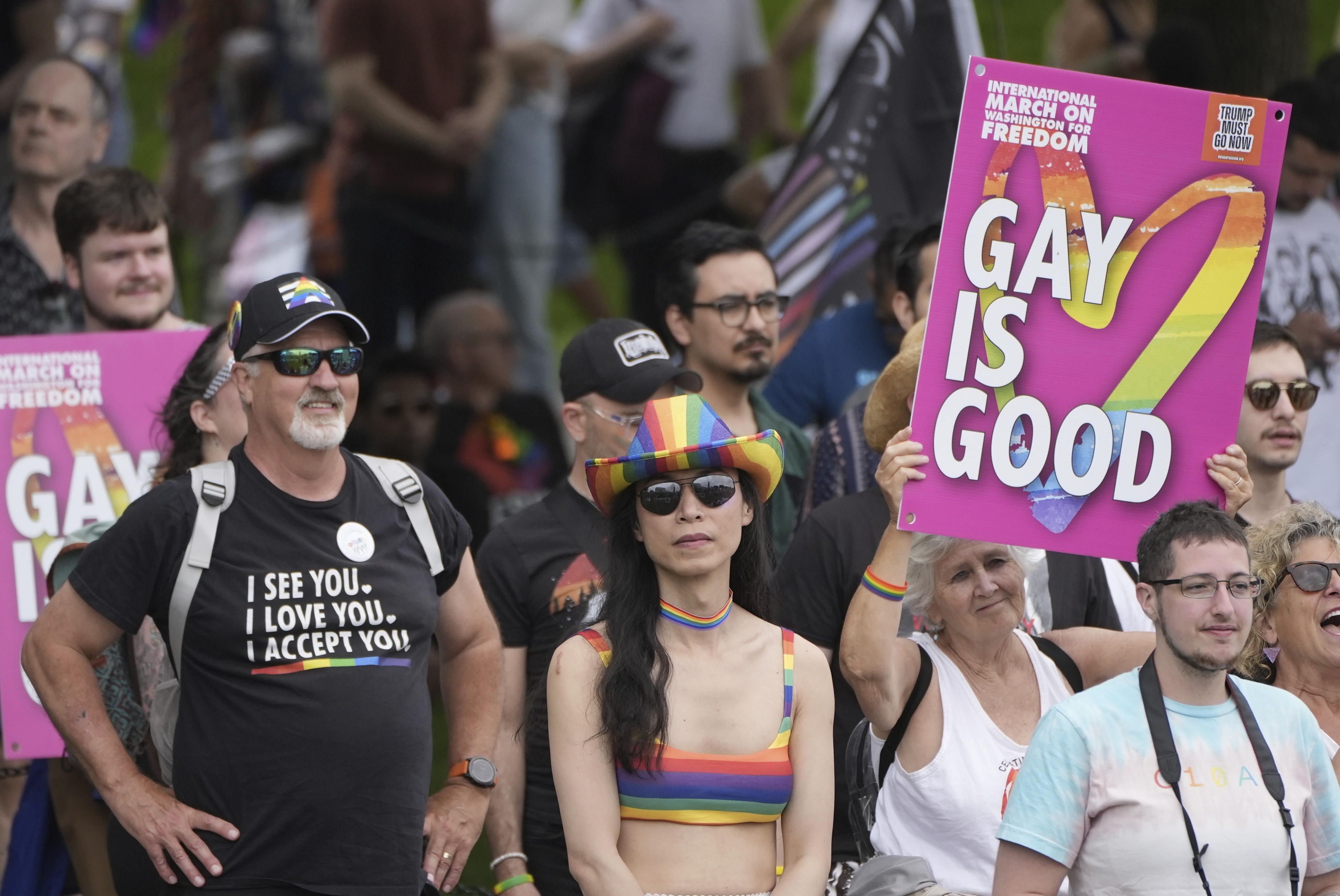People attend the World Pride Rally and March at the Lincoln Memorial, Sunday, June 8, 2025, on the National Mall in Washington. (AP Photo/Alex Brandon)