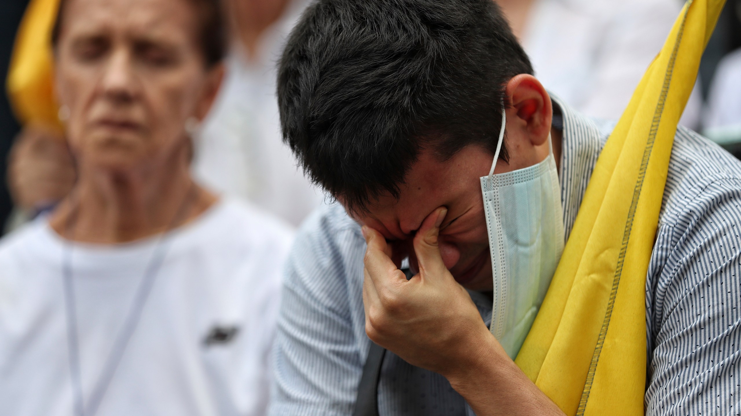 A man prays for Colombian Senator Miguel Uribe Turbay's recovery after he was shot at a political rally, in Cali, Colombia, Sunday, June 8, 2025. (AP Photo/Santiago Saldarriaga)