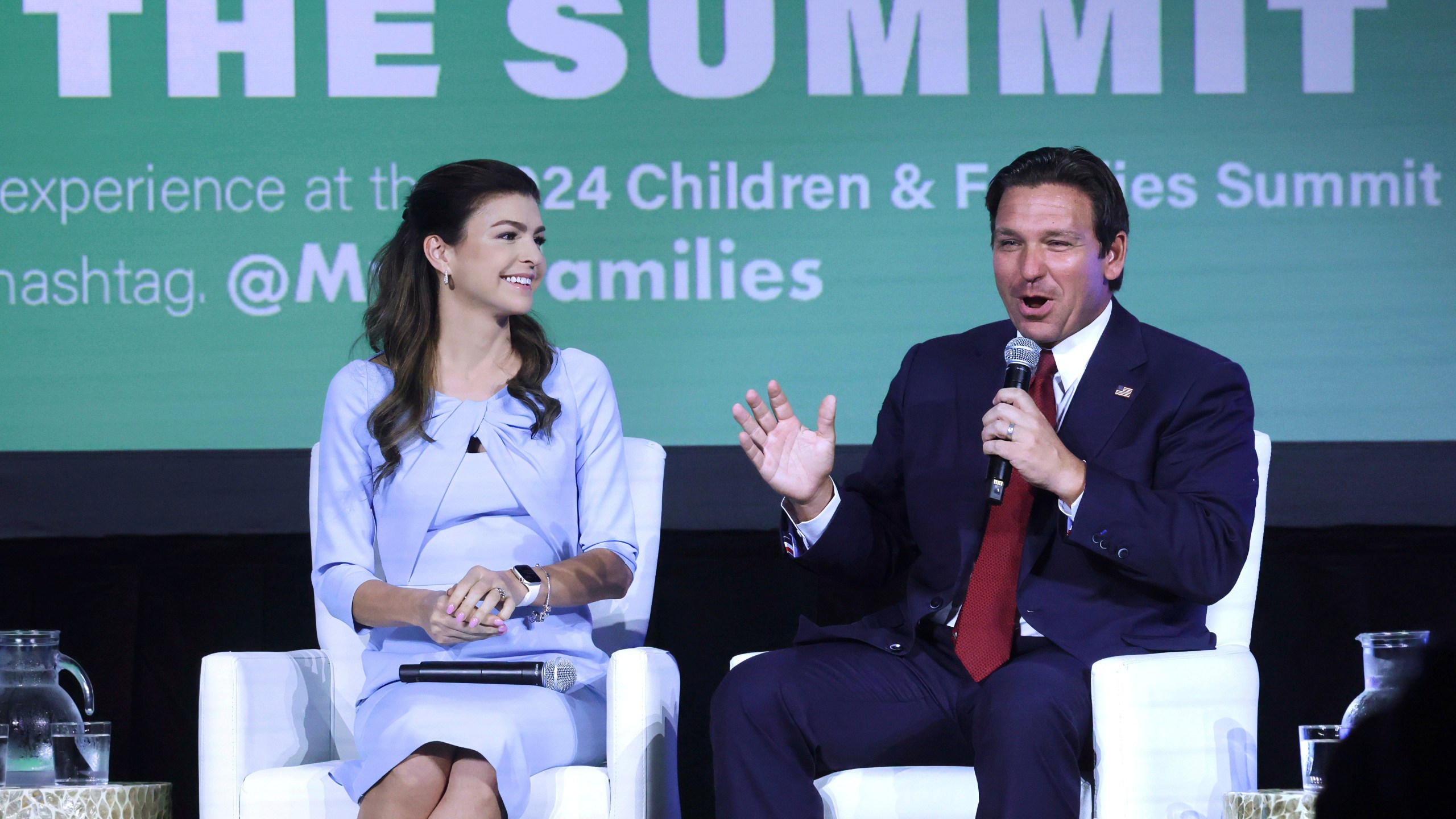 FILE - Florida first lady Casey DeSantis listens to Gov. Ron DeSantis during a panel discussion at the 2024 Florida Children and Families Summit at the JW Marriott Grand Lakes in Orlando, Fla., Sept. 4, 2024. (Joe Burbank/Orlando Sentinel via AP, File)