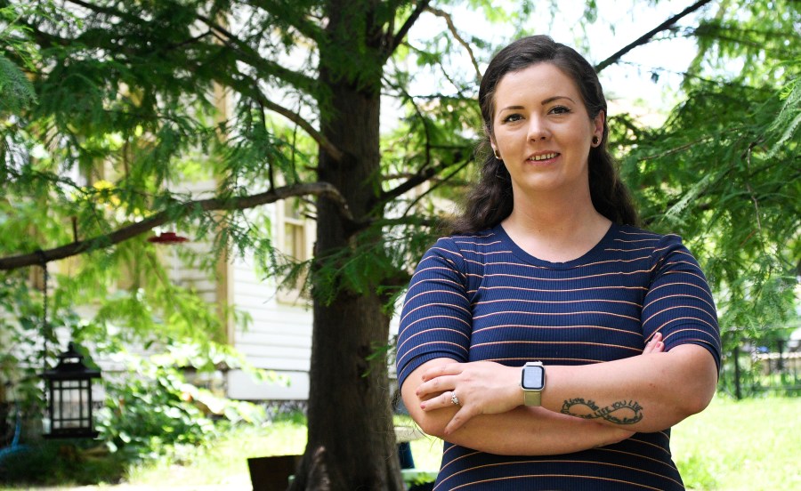 Brittnee Nelson, who runs her own housecleaning business, poses for a portrait in her neighborhood in Shreveport, La., Monday, June 9, 2025. (AP Photo/Jill Pickett)