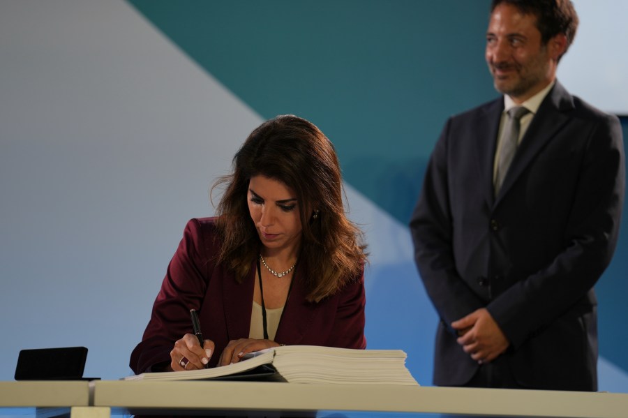 Diplomat Leena Al-Hadid, of Jordan, signs the High Seas Treaty during the U.N. Ocean Conference, Monday, June 9, 2025, in Nice, France. (AP Photo/Annika Hammerschlag)