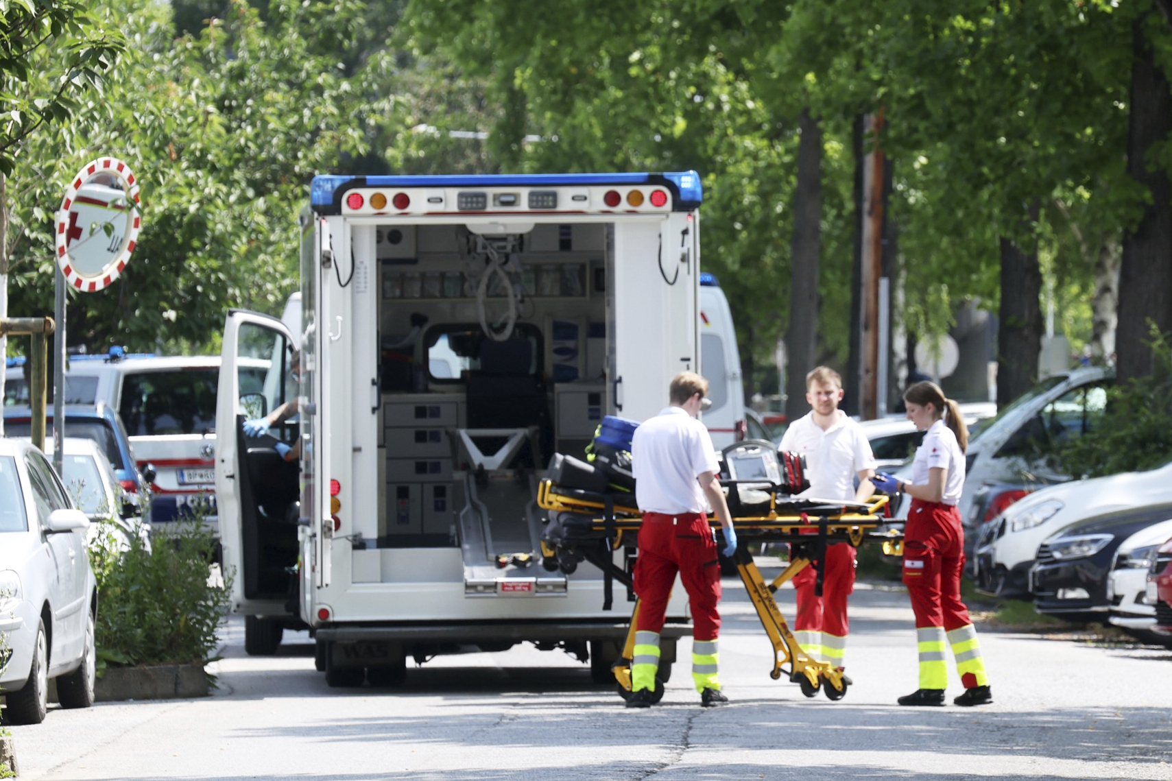 Rescue service personnel attend the scene of a shooting at a school in Graz, Austria, Tuesday, June 10, 2025. (Kleine Zeitung via AP)