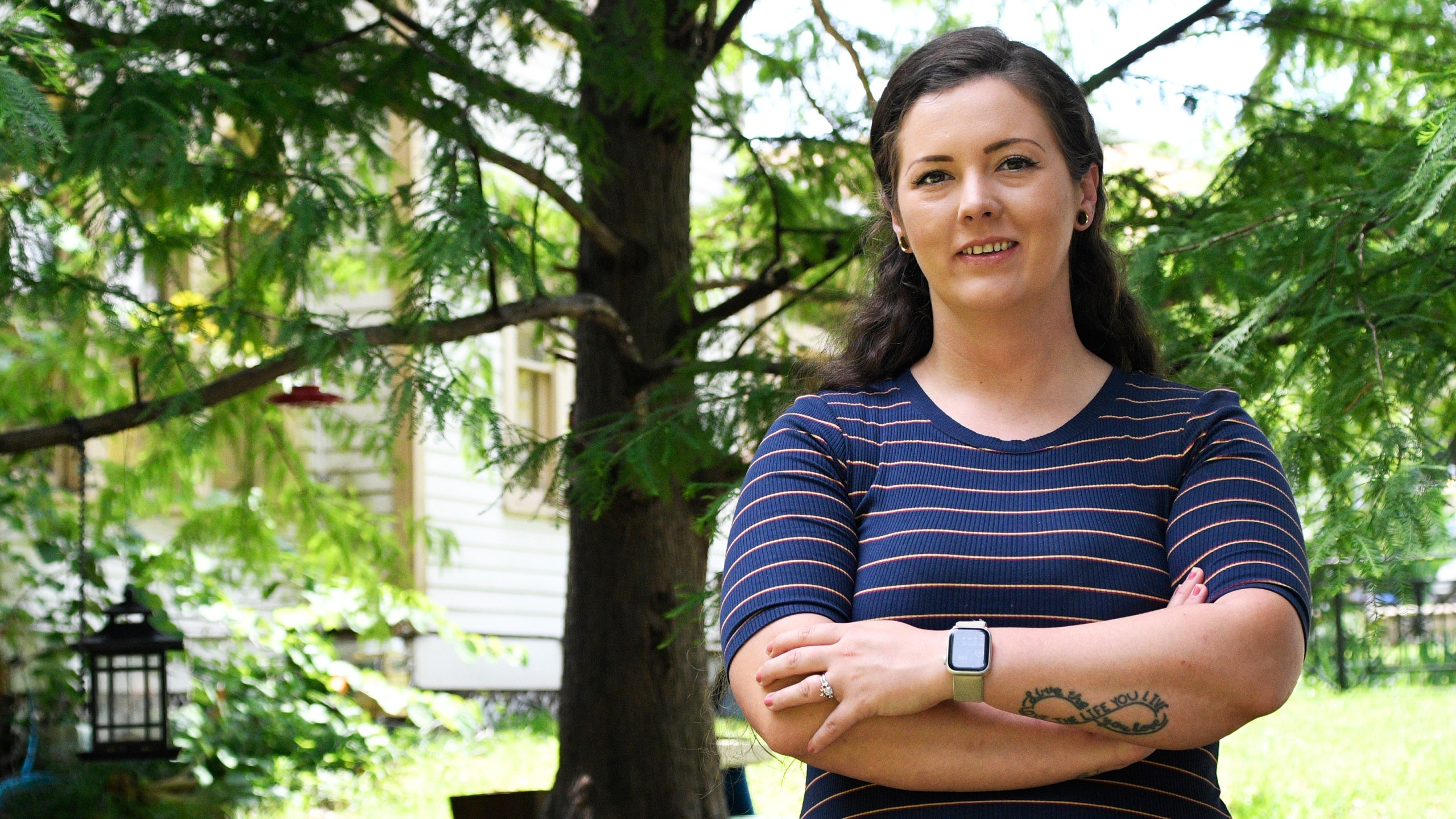 Brittnee Nelson, who runs her own housecleaning business, poses for a portrait in her neighborhood in Shreveport, La., Monday, June 9, 2025. (AP Photo/Jill Pickett)