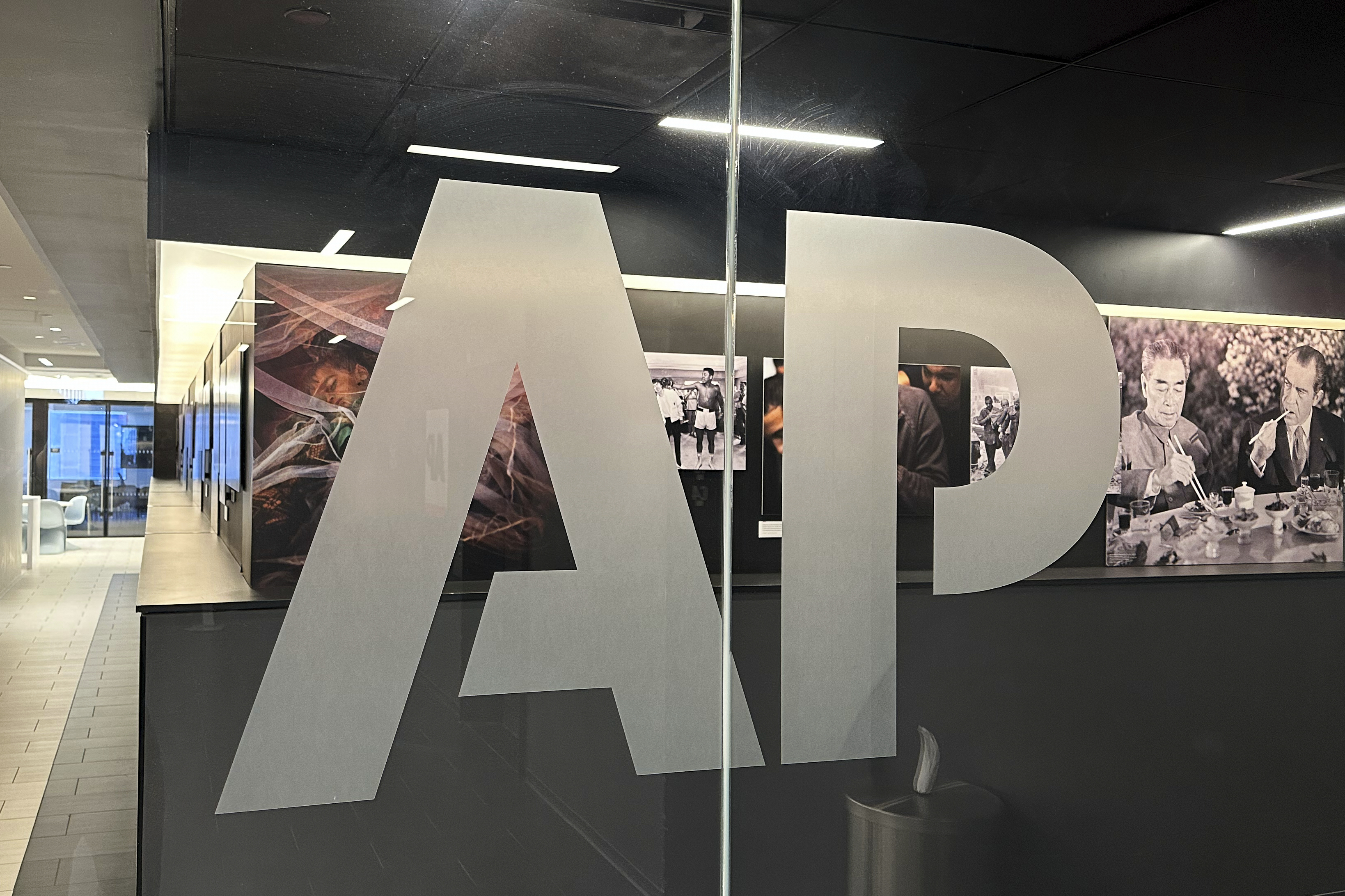 FILE - The Associated Press logo is displayed at the news organization's world headquarters in New York on April 9, 2025. (AP Photo/Aaron Jackson, File)