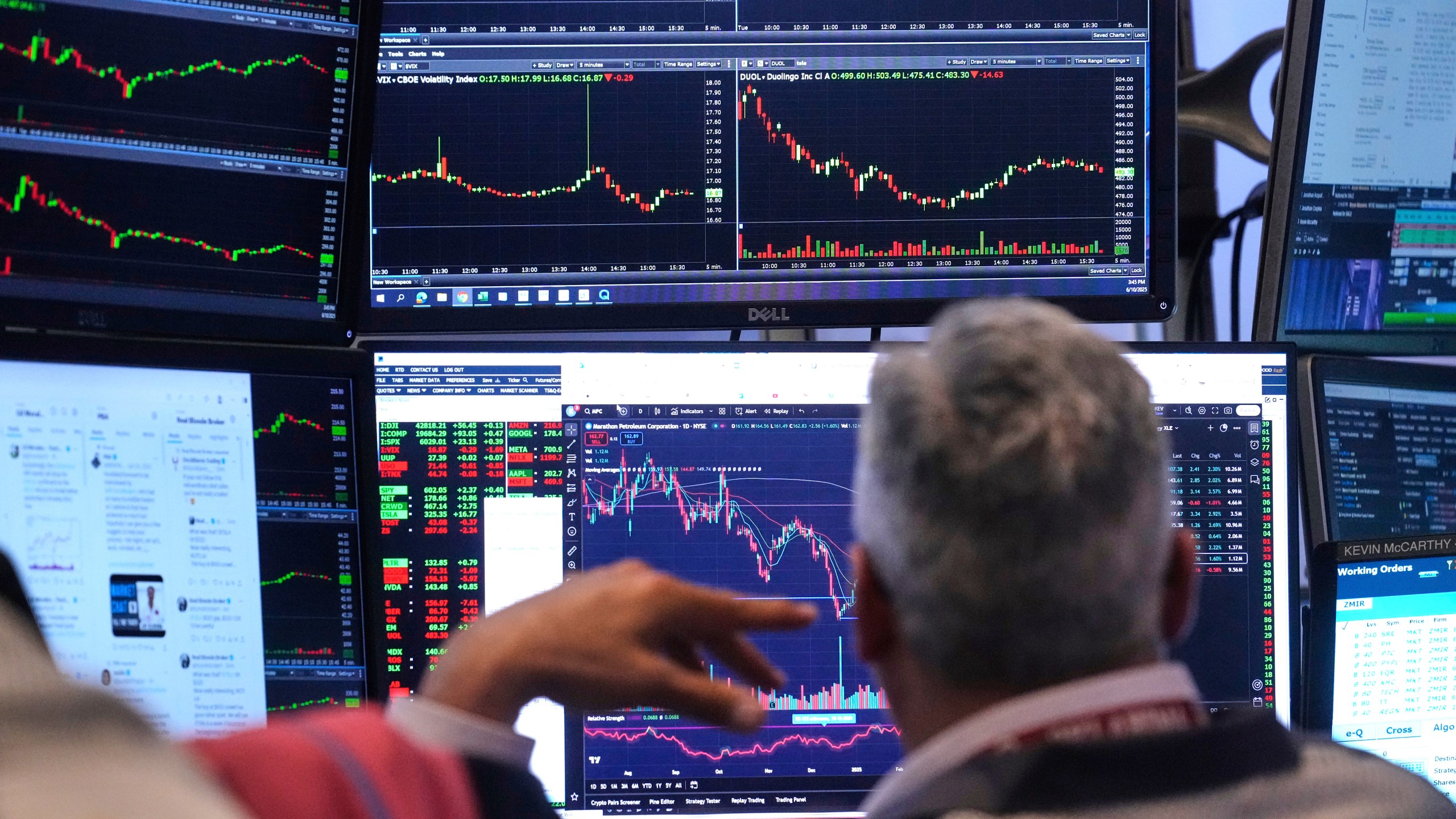A trader watches his monitors as he works on the floor of the New York Stock Exchange, Tuesday, June 10, 2025. (AP Photo/Richard Drew)
