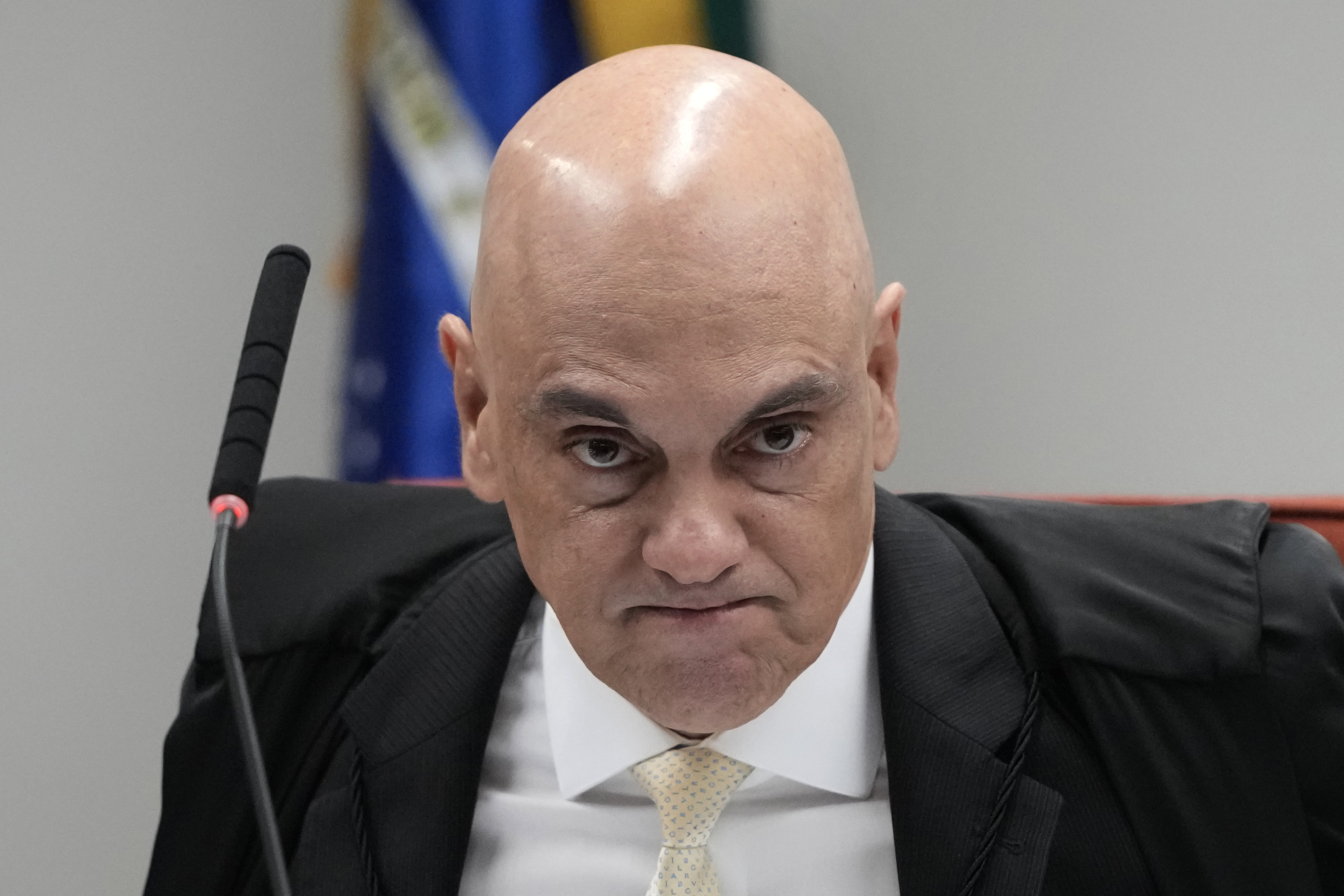 Brazilian Supreme Court Judge Alexandre de Moraes holds a trial for those charged in an alleged coup plot to keep former President Jair Bolsonaro in office after his 2022 election defeat, in Brasilia, Brazil, Tuesday, June 10, 2025. (AP Photo/Eraldo Peres)
